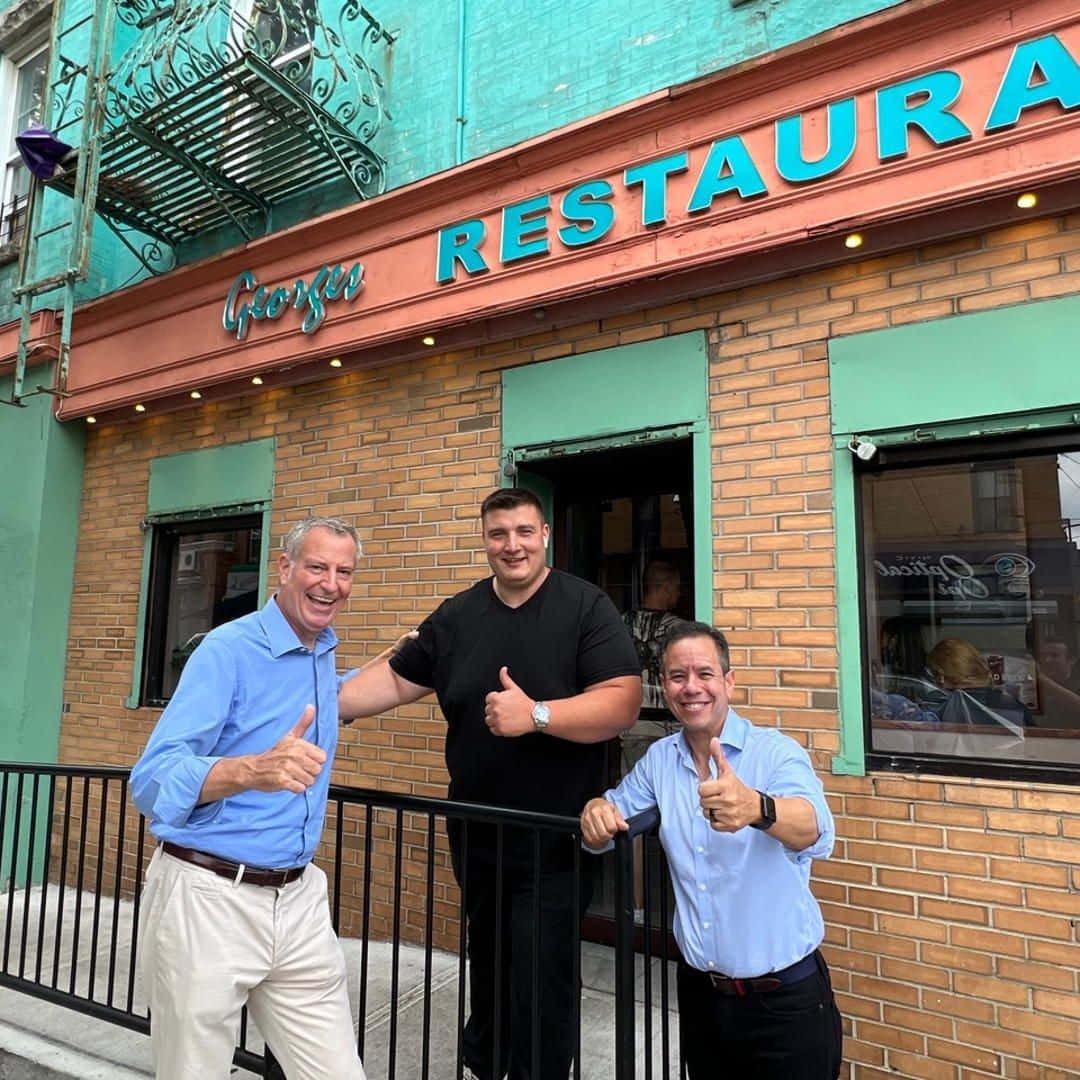Bill De Blasio With Business Owners Background