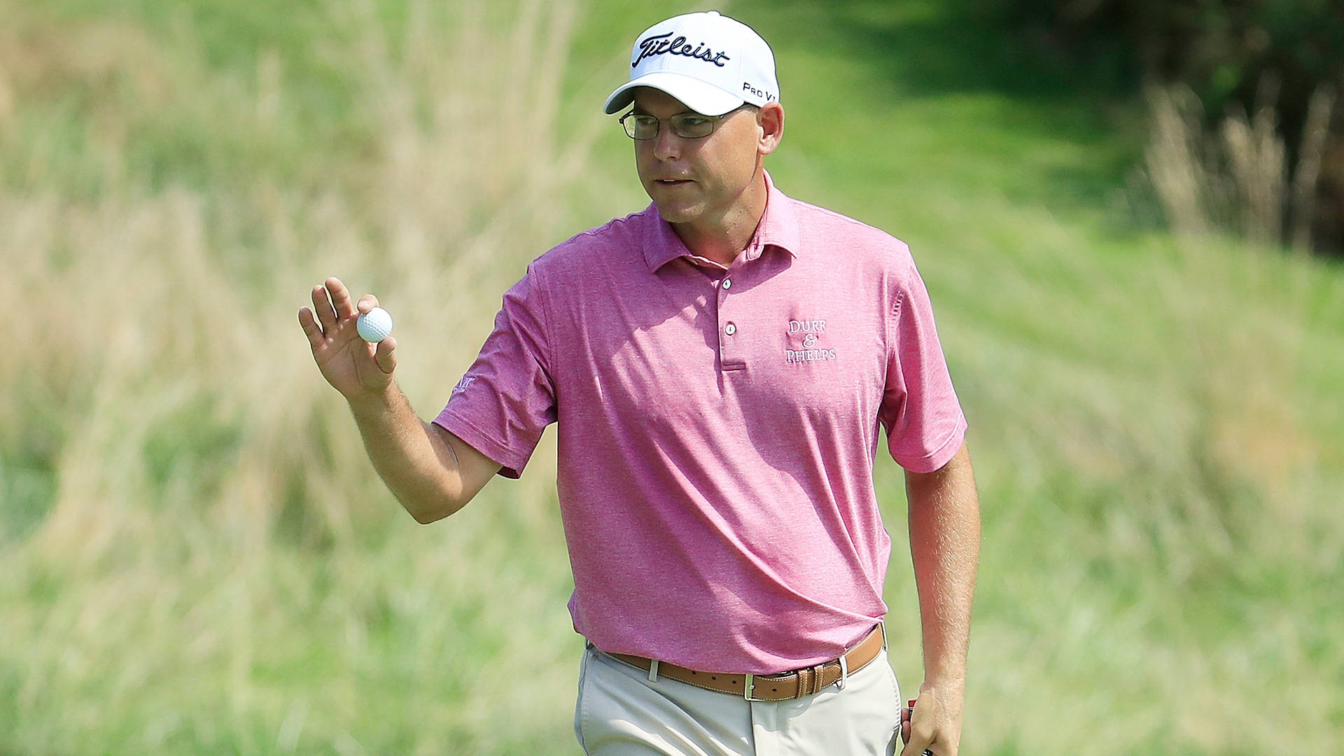 Bill Haas In A Grassy Field Background