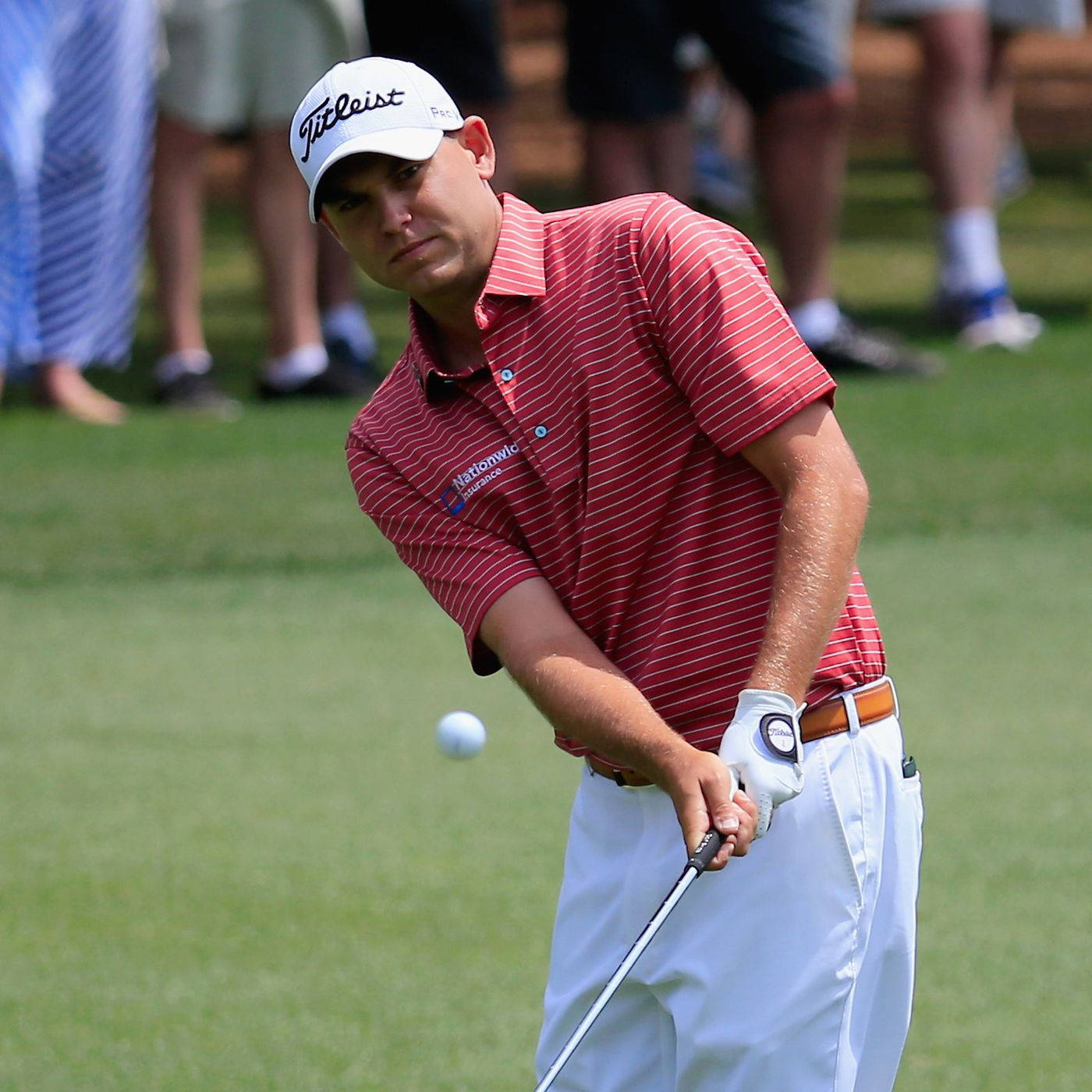 Bill Haas In Perfect Form During A Golf Game Background