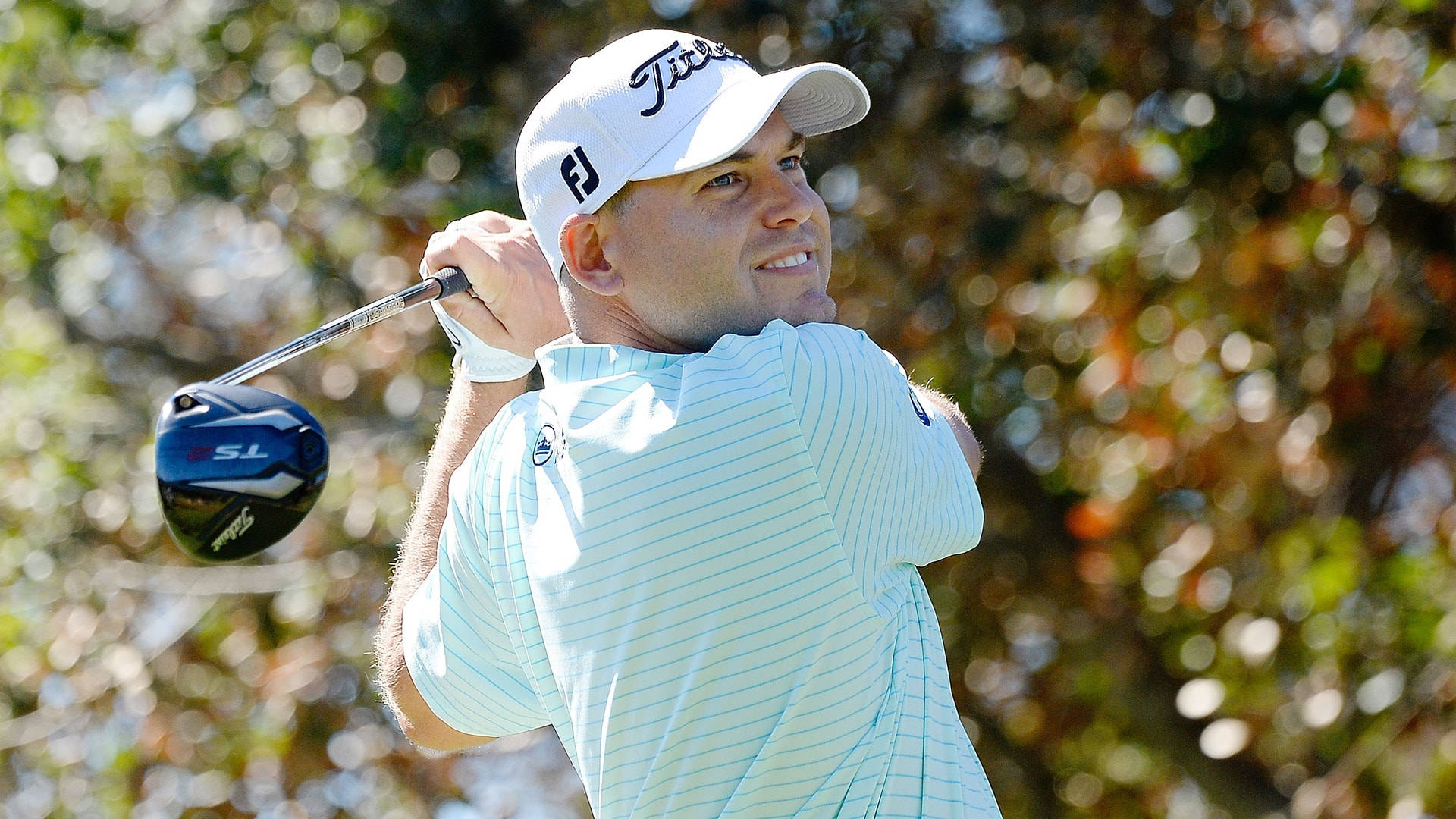 Bill Haas Playing On A Sunny Day Background