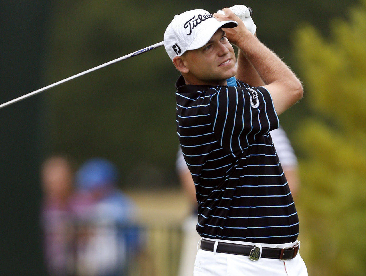 Bill Haas Smiling After A Shot Background