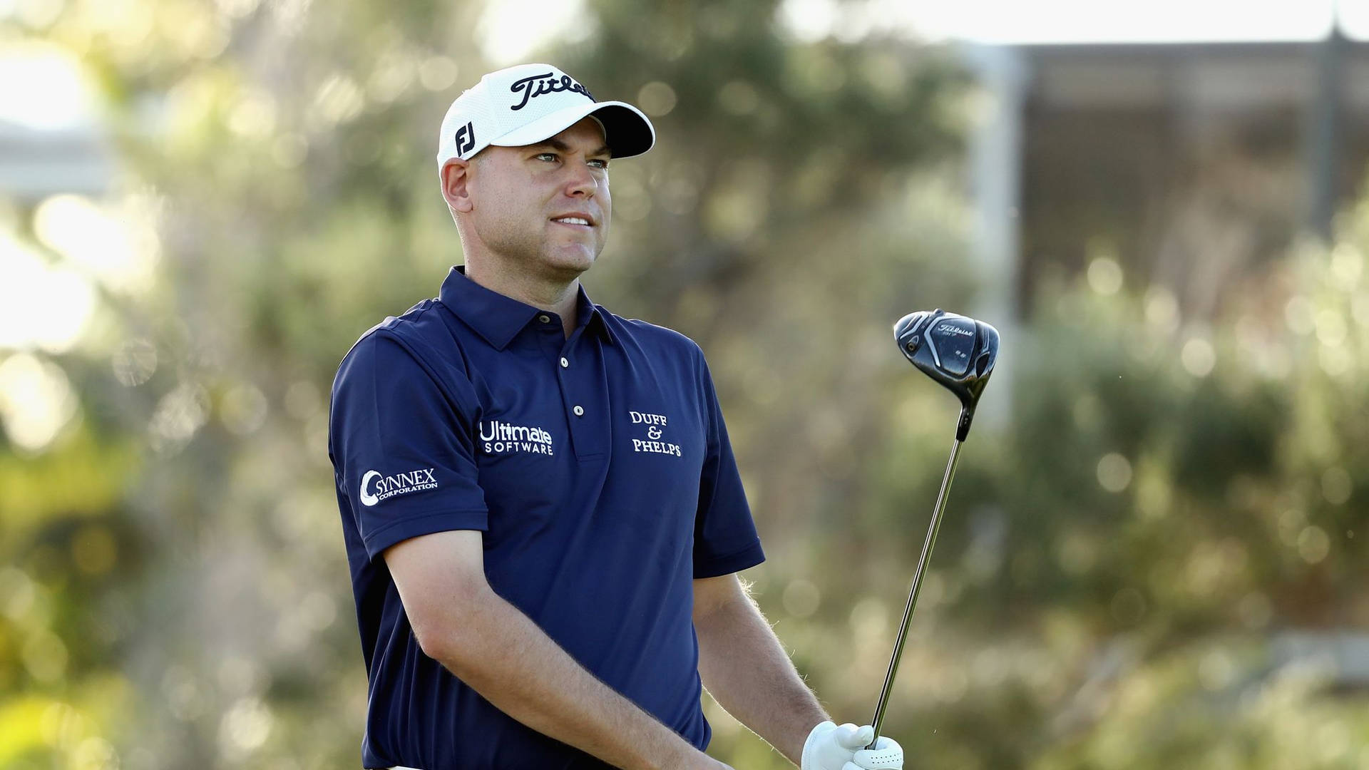 Bill Haas Sporting A Navy Blue Shirt Background