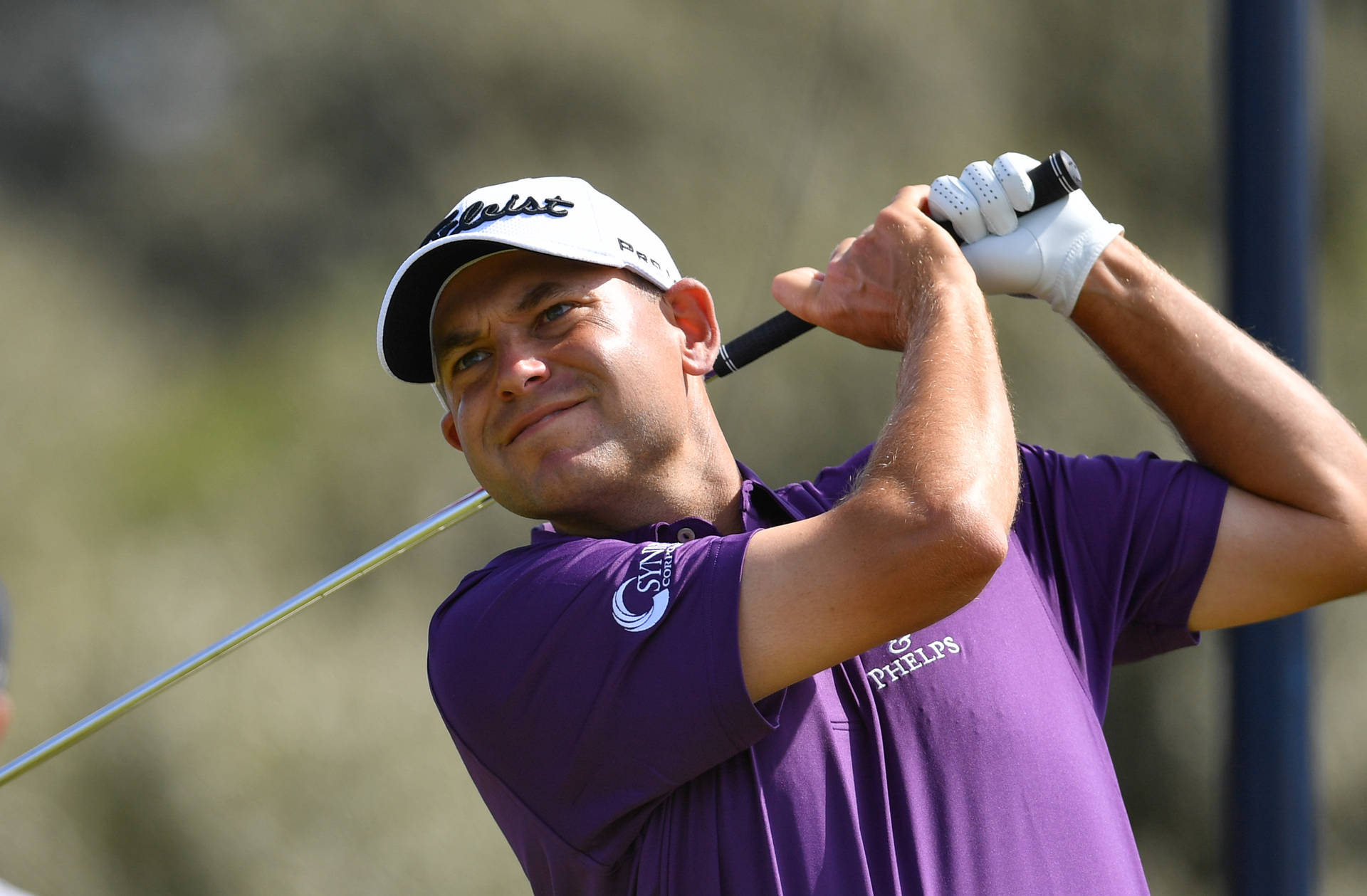 Bill Haas Sporting A Purple Shirt Background