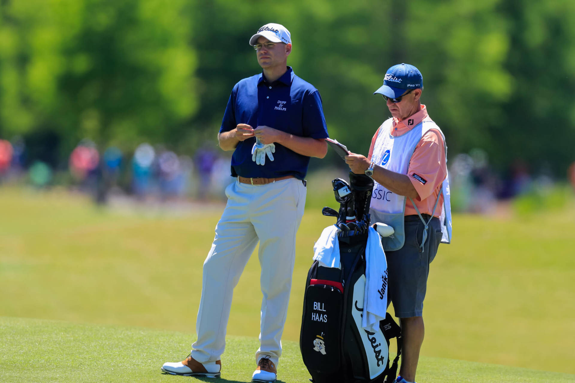 Bill Haas Standing With His Caddie Background