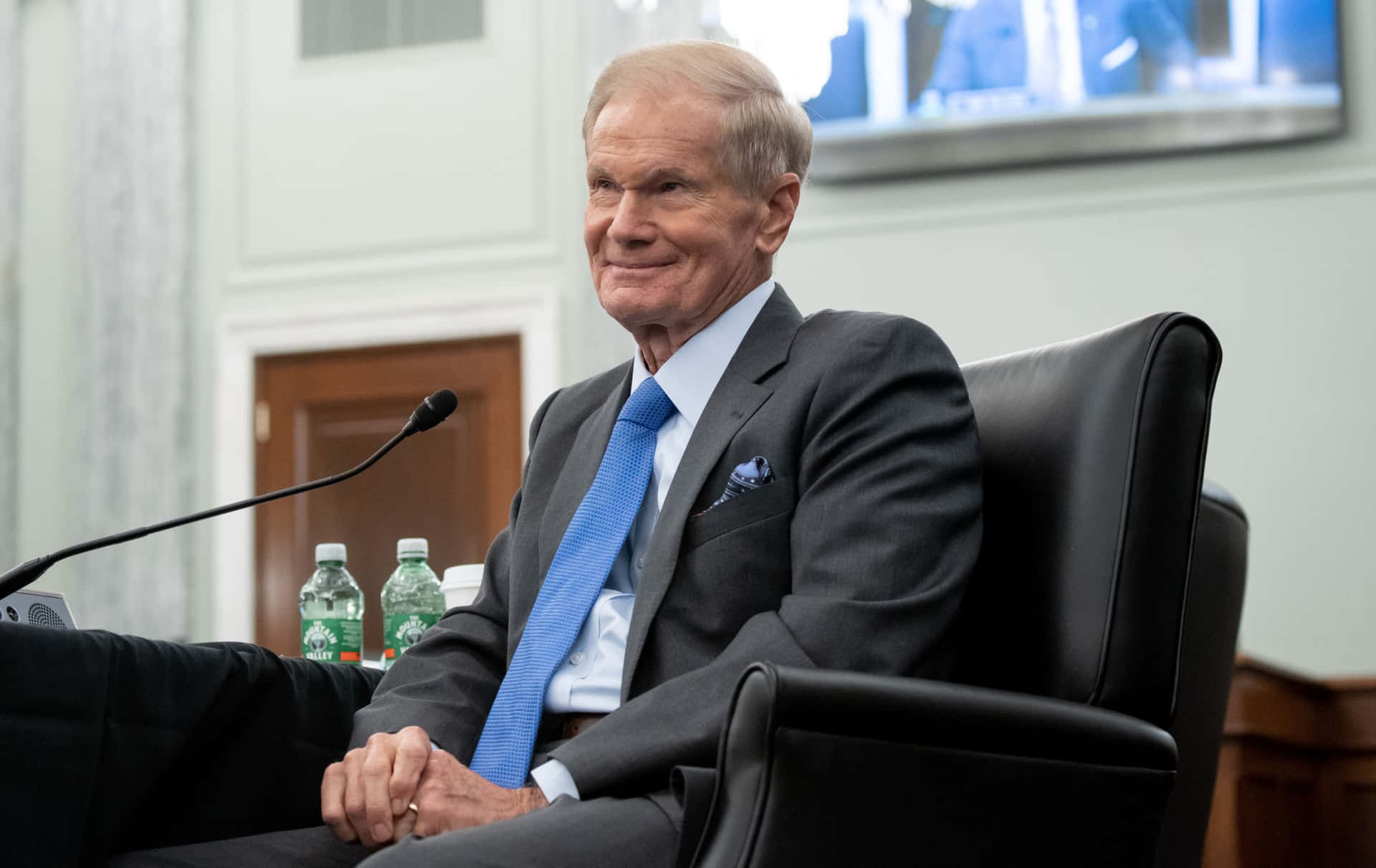 Bill Nelson Poses In A Black Suit Background