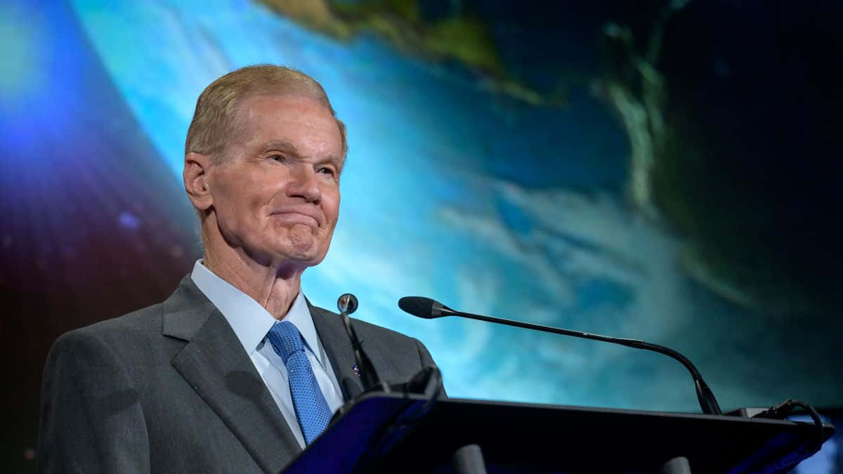 Bill Nelson With The Backdrop Of A Planet Background