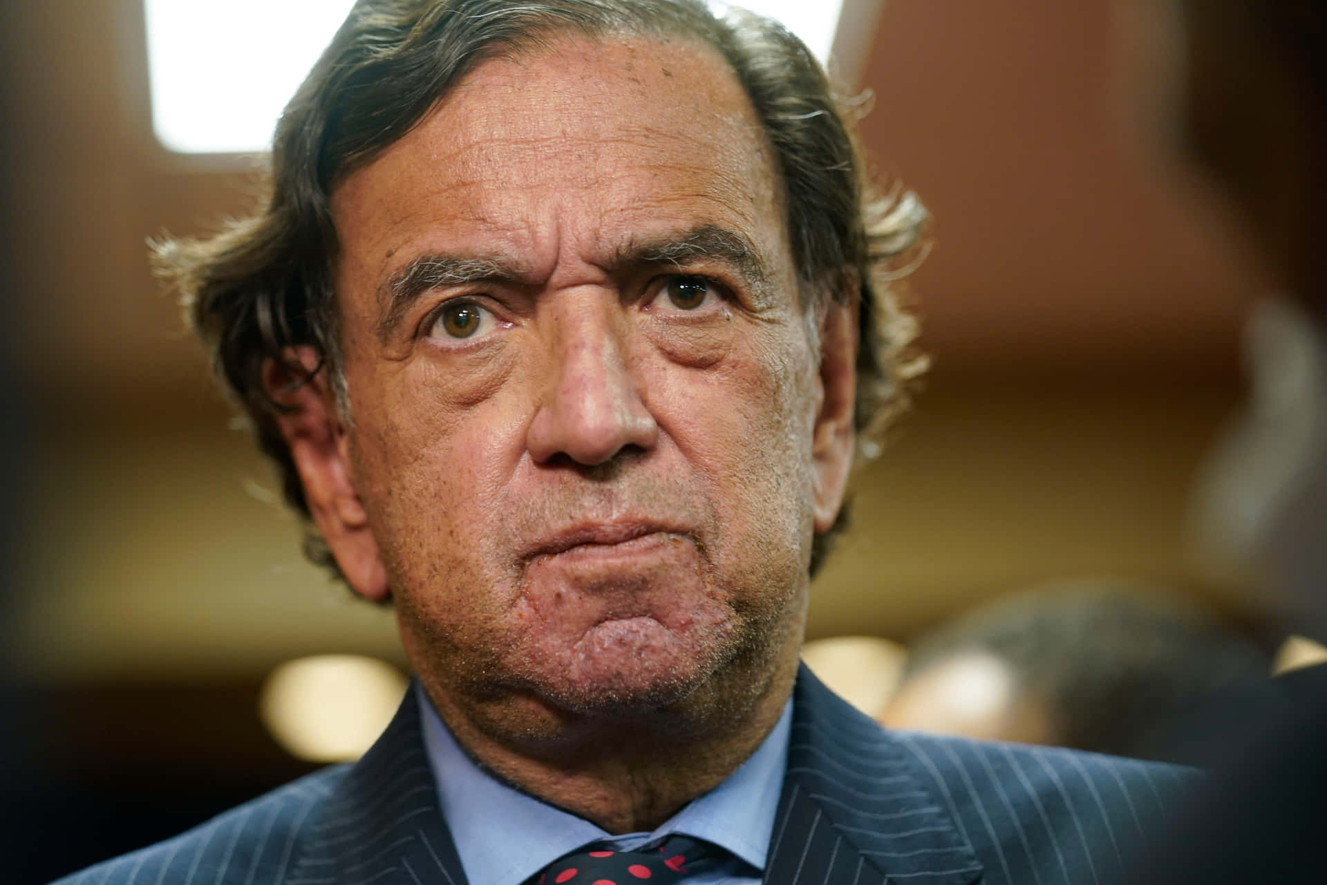 Bill Richardson Solemn Expression Background