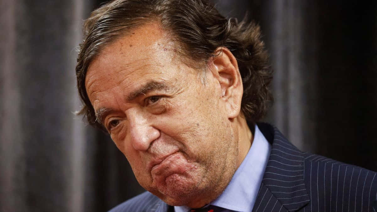Bill Richardson Sporting A Subtle Smile. Background