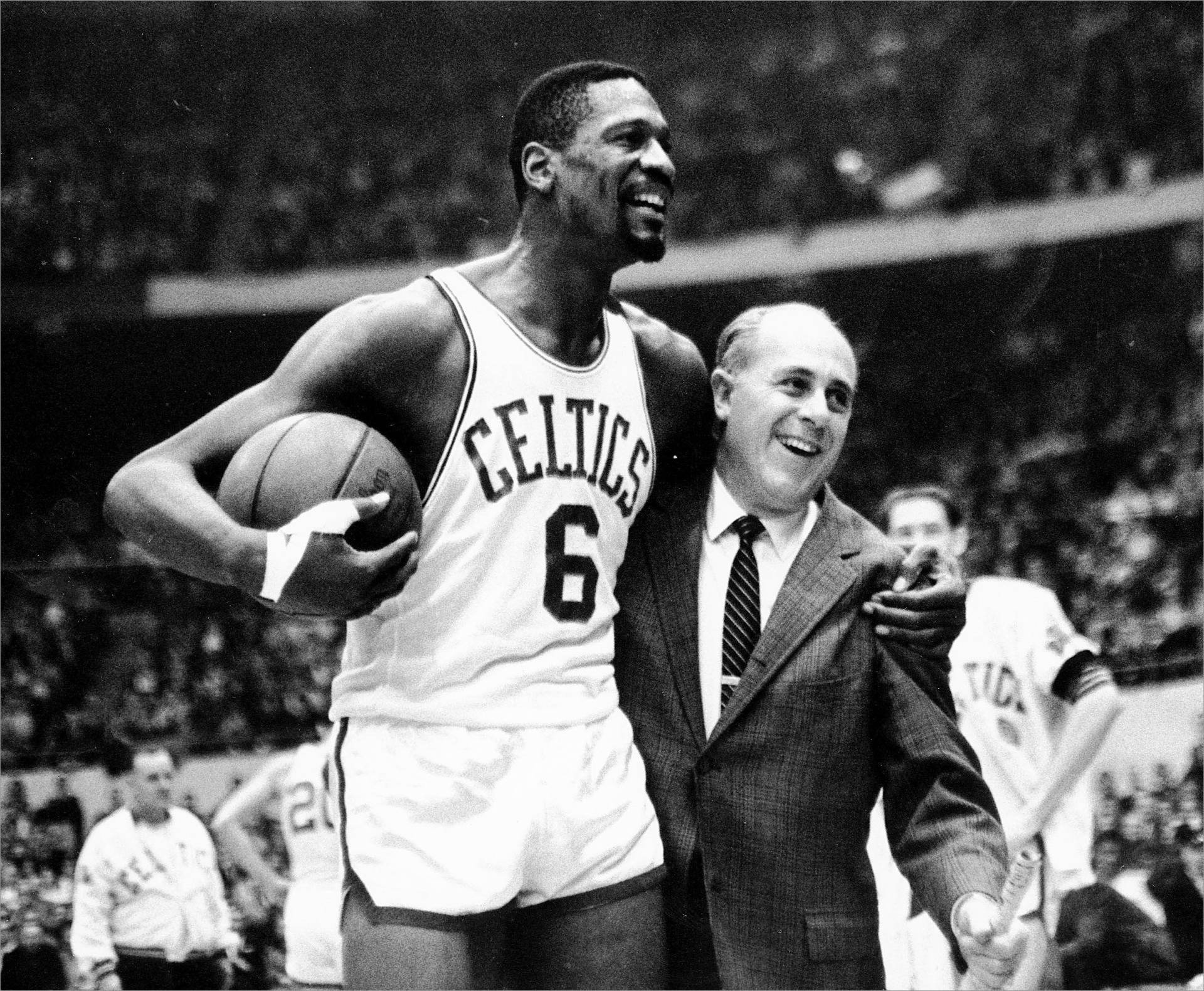 Bill Russell Hugging Red Auerbach Background