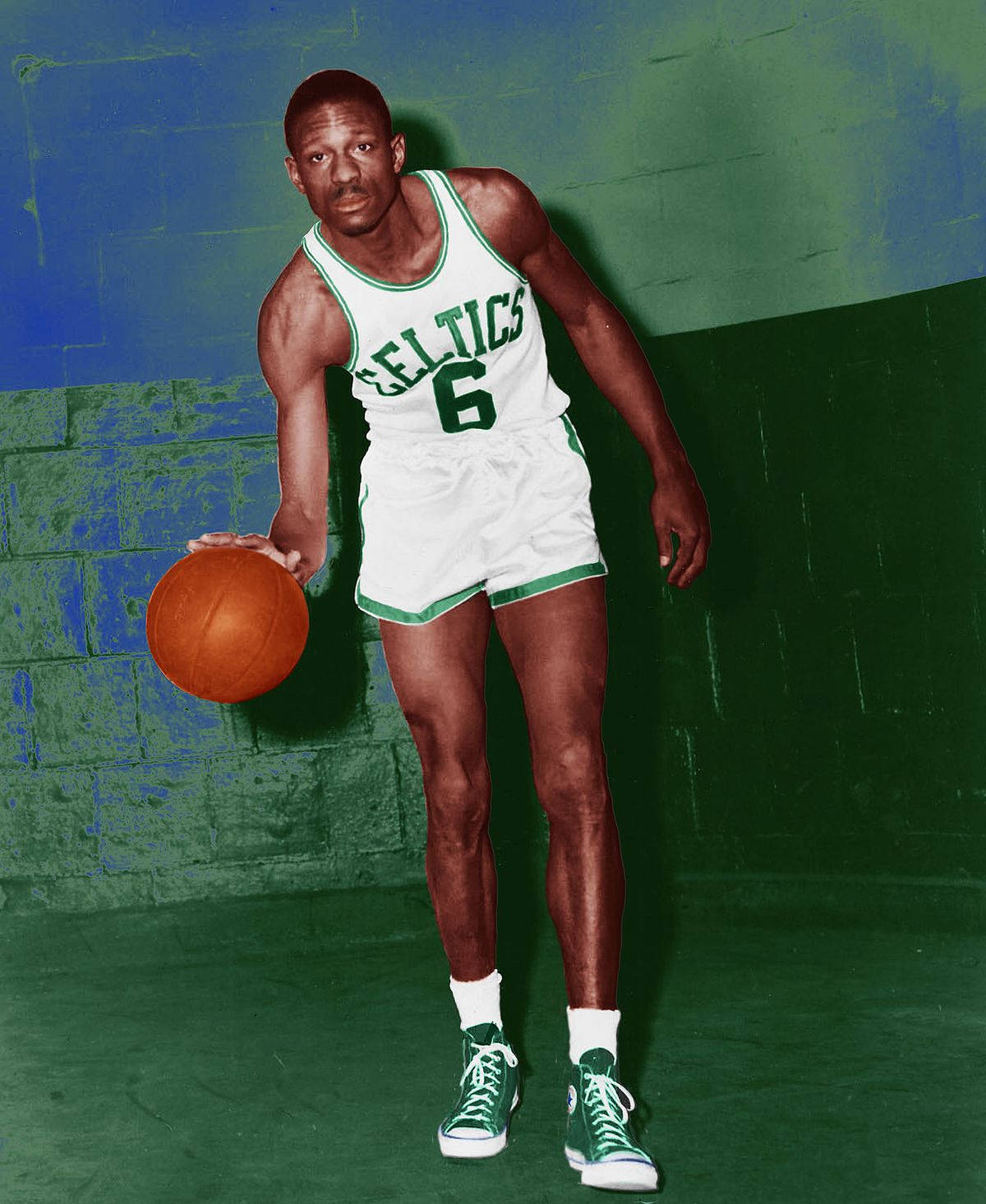 Bill Russell In Front Of A Wall Background