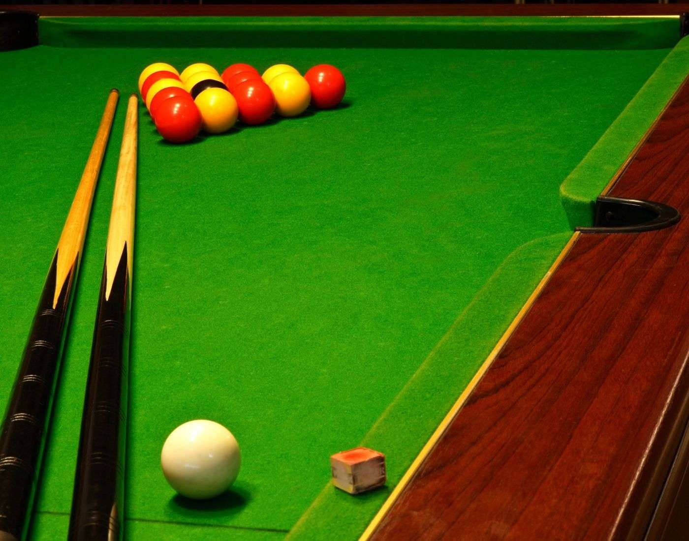 Billiards Pool Sticks And Balls On Pool Table Background