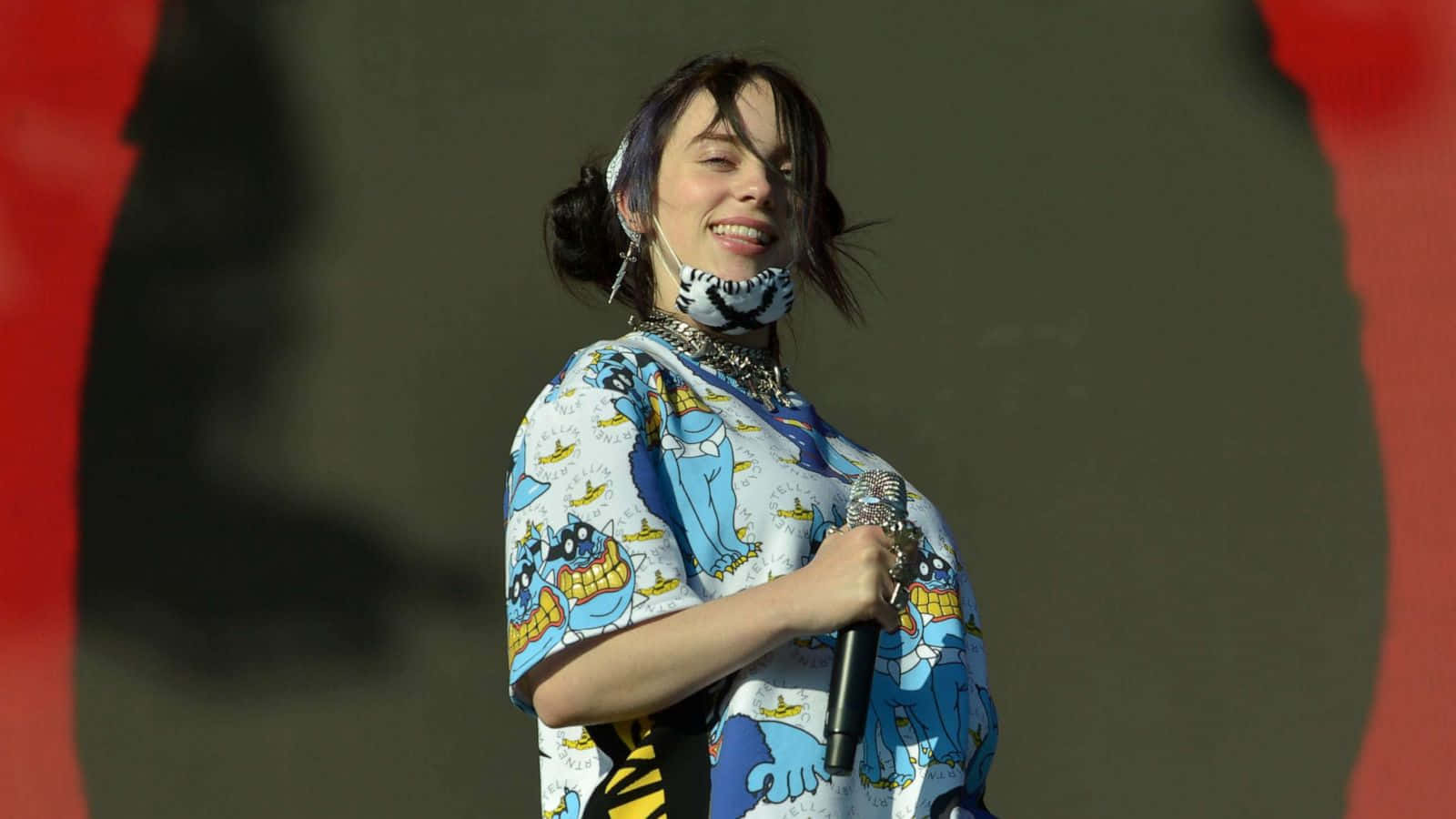 Billie Eilish Confidently Turns On Her Laptop, Ready To Create Her Unique Style Of Music. Background