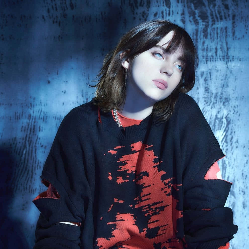 Billie Eilish Contemplative Blue Light Background