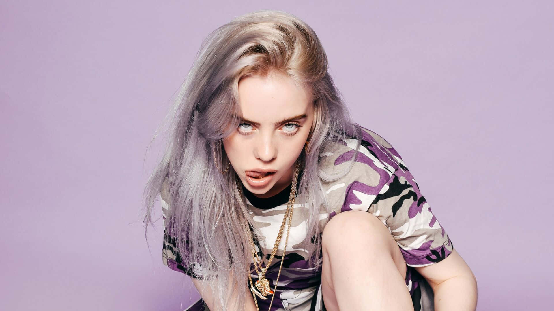 Billie Eilish Listening To Music On Her Laptop. Background