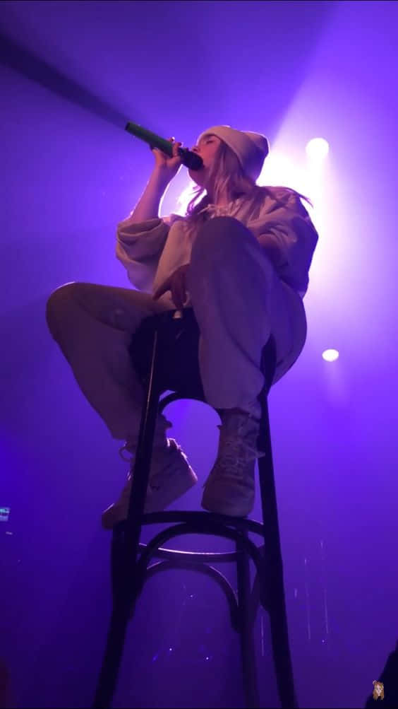 Billie Eilish Purple Low Angle Shot Background