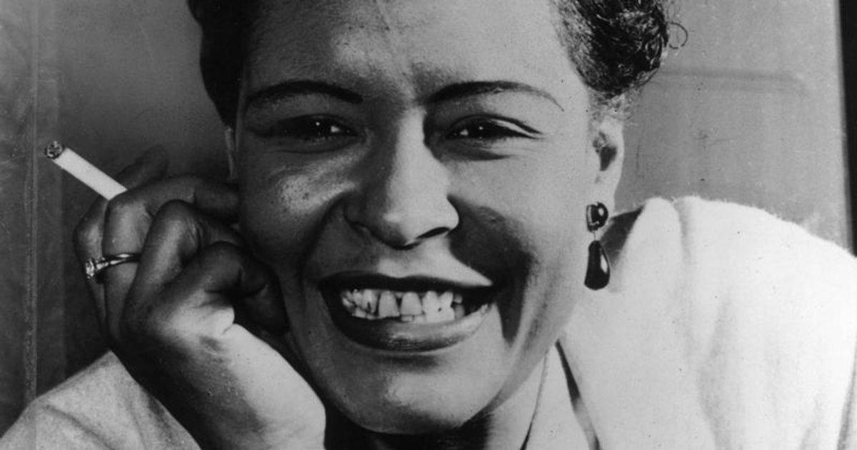 Billie Holiday Holding A Cigarette Background