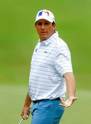Billy Andrade Gesturing With His Hand Background