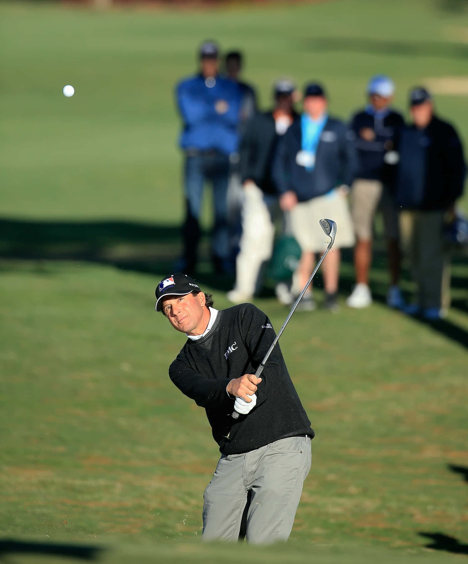 Billy Andrade Performs A Golf Swing Background