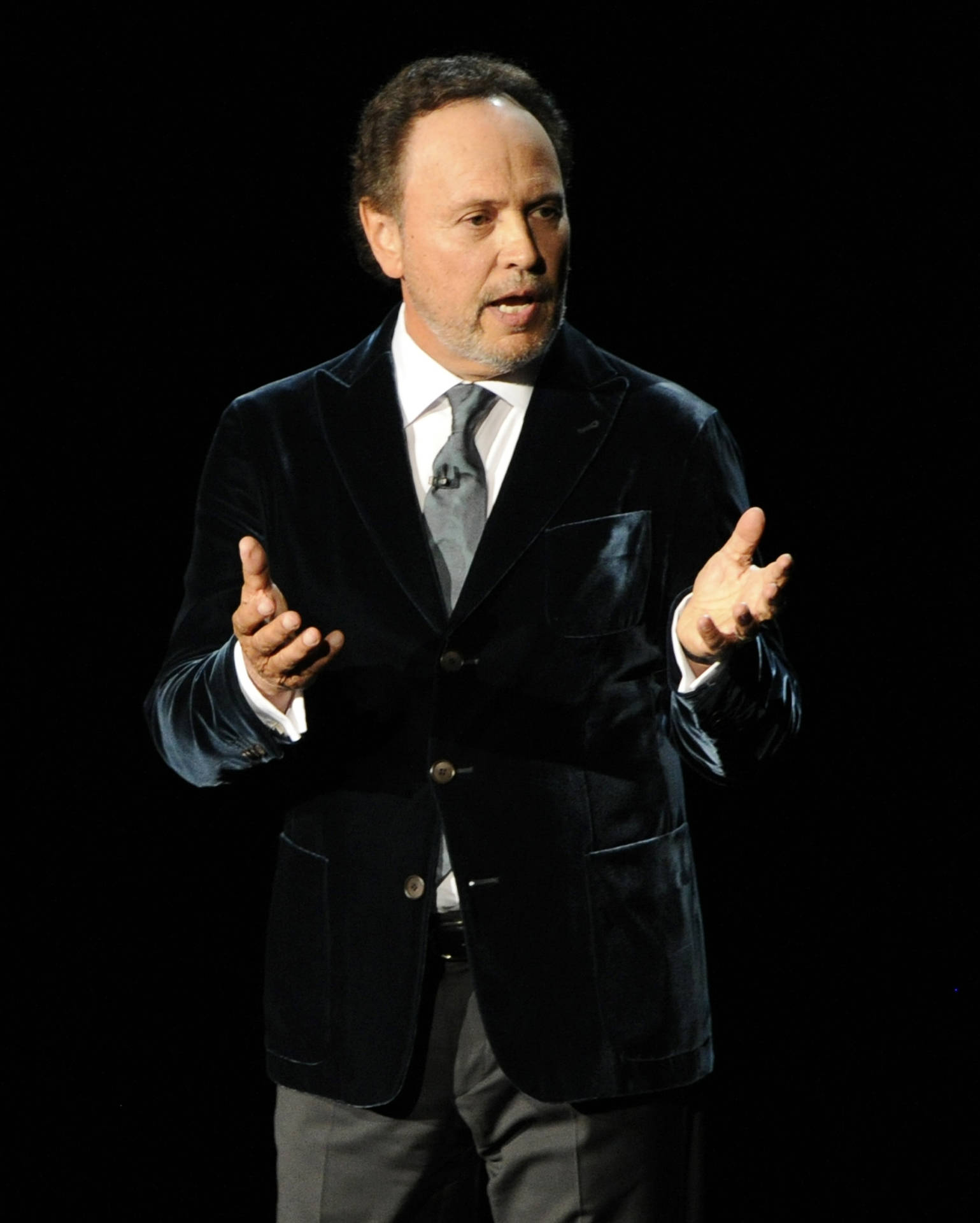 Billy Crystal Talks At Emmy Awards Background