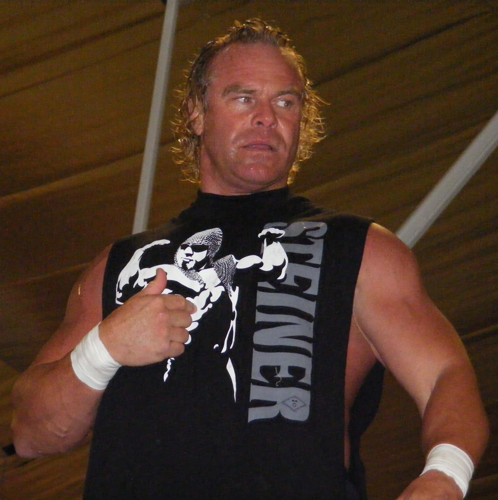 Billy Gunn In A Black Printed Shirt Background