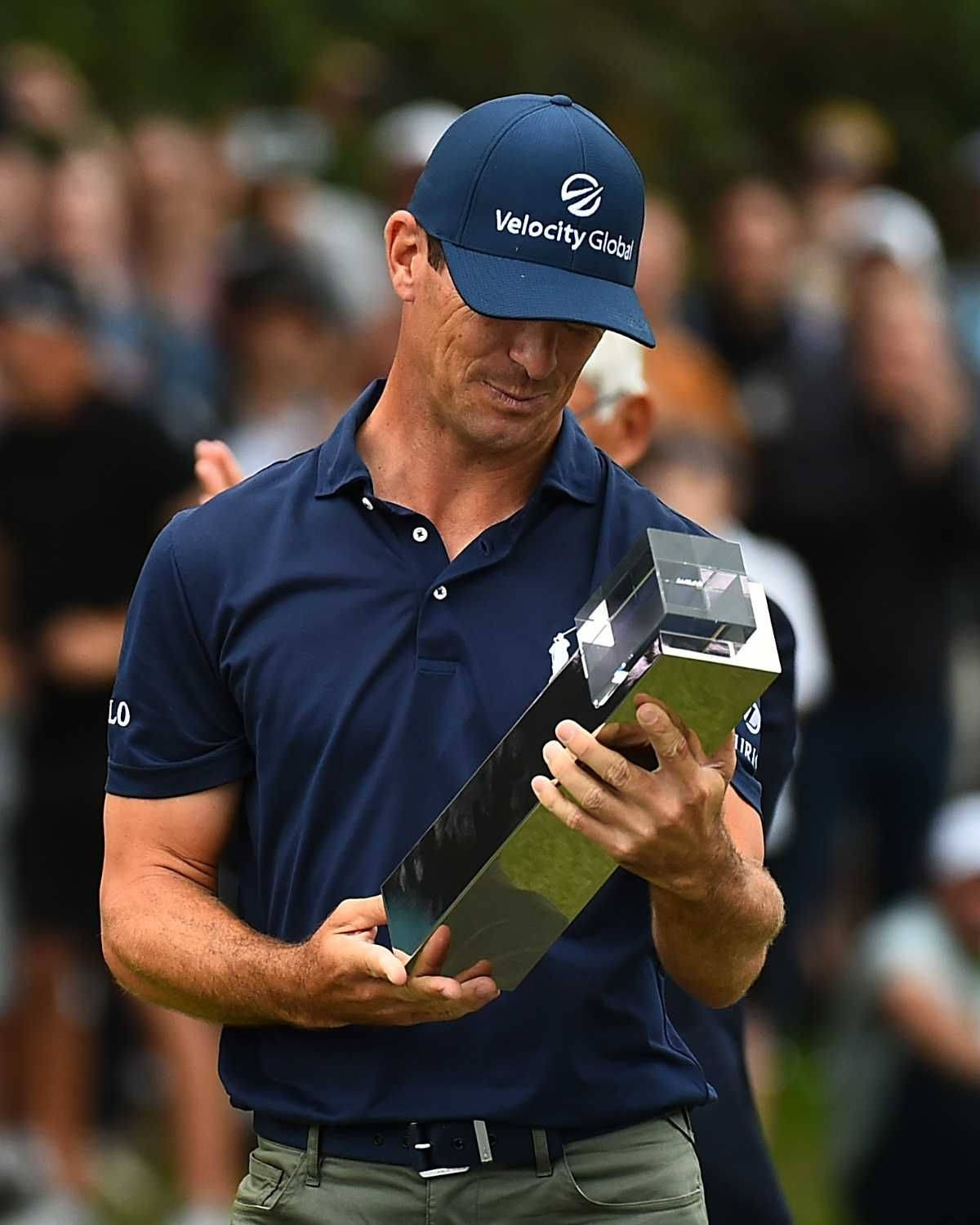 Billy Horschel Looking At His Trophy