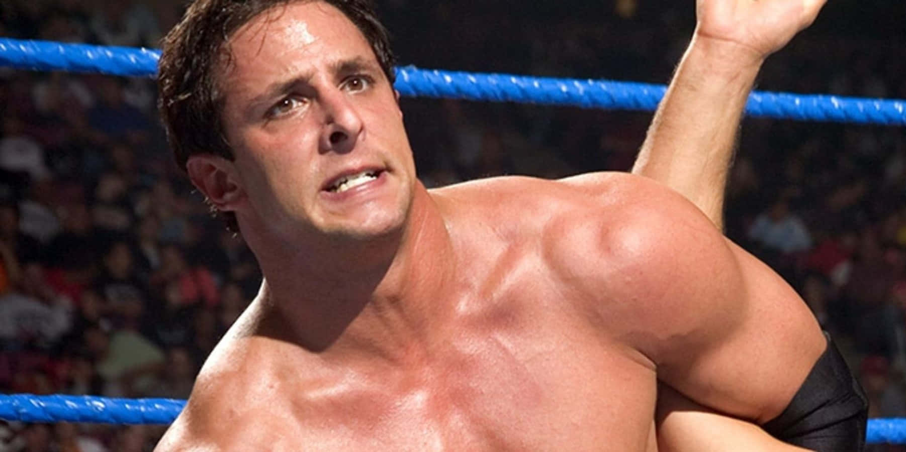 Billy Kidman In The Midst Of A Wwe Fight Background