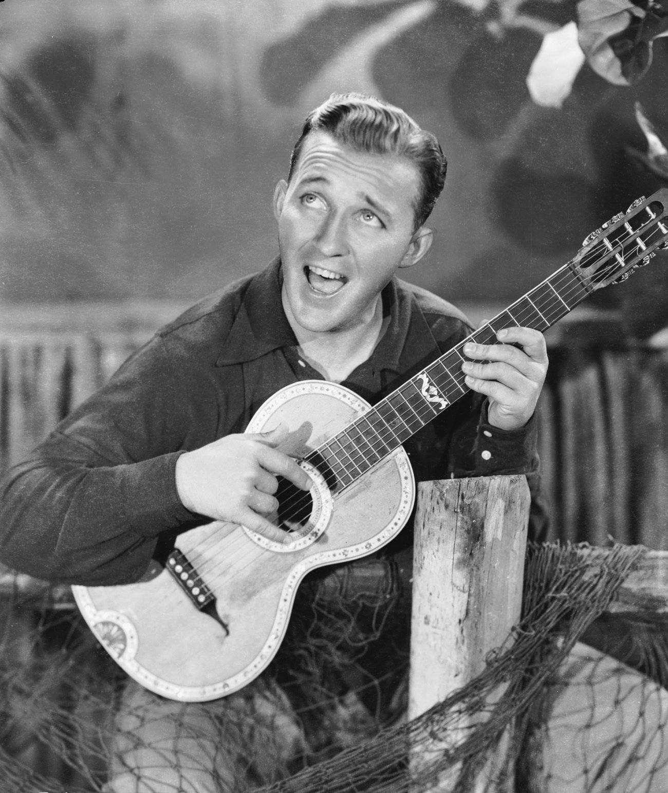 Bing Crosby Strumming A Ukulele Background