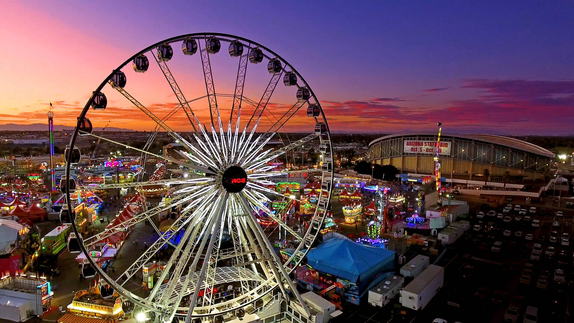 Bird’s-eye View Of Fair During Sunset Background