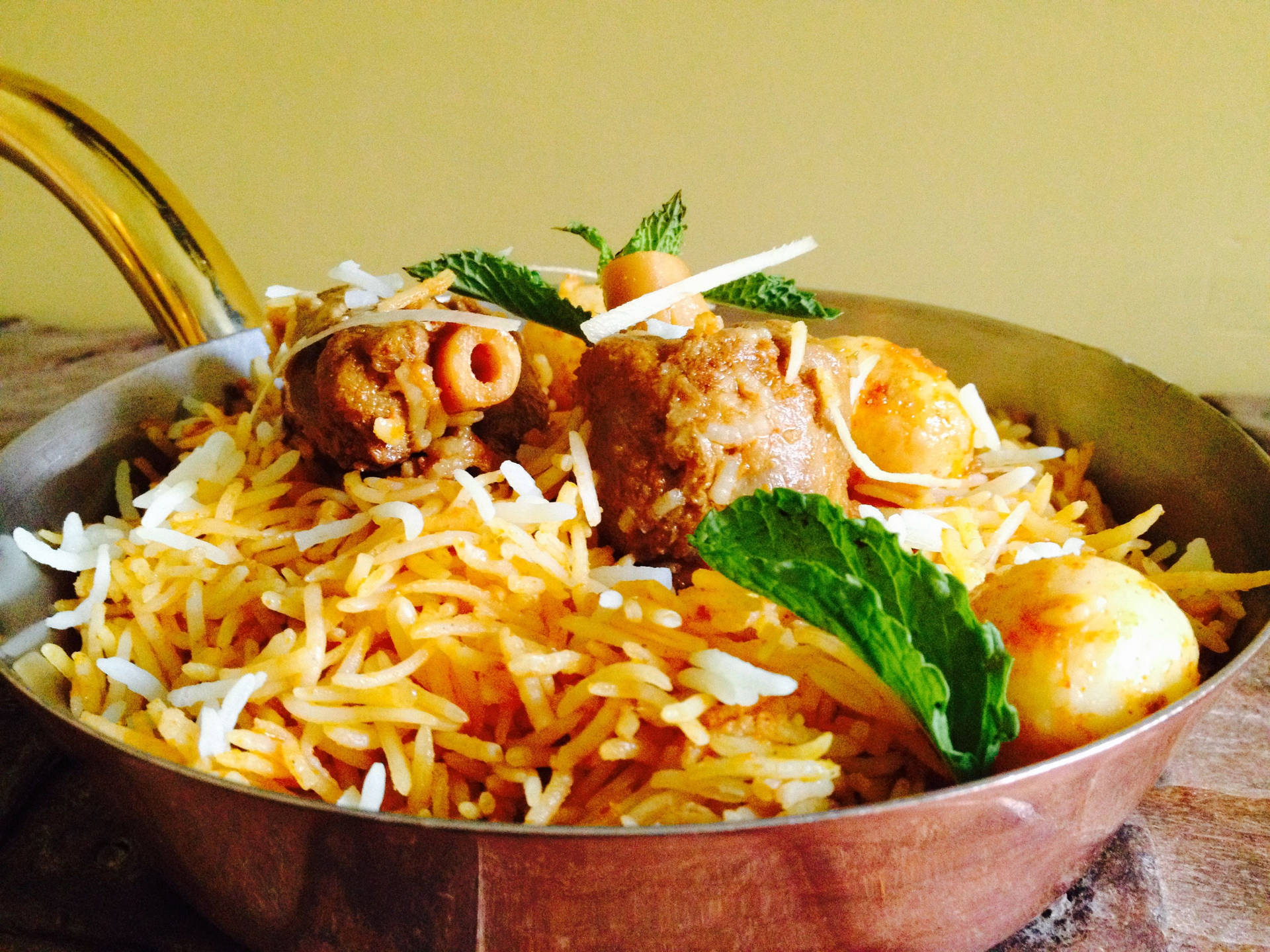 Biryani In Silver Pot Background