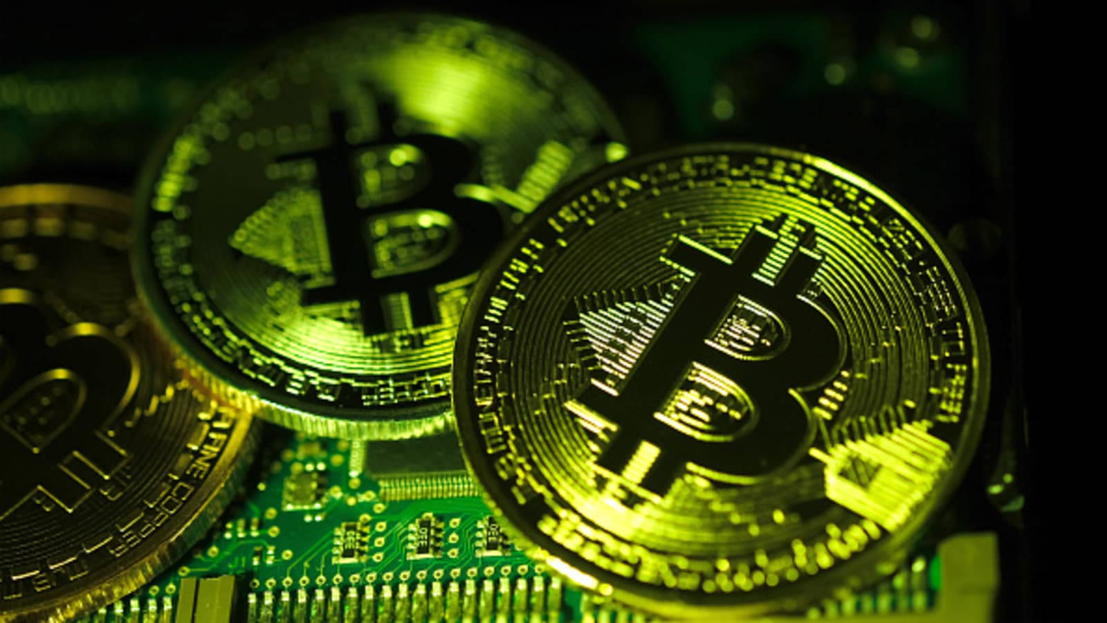 Bitcoins On Green Motherboard Crypto Background Background