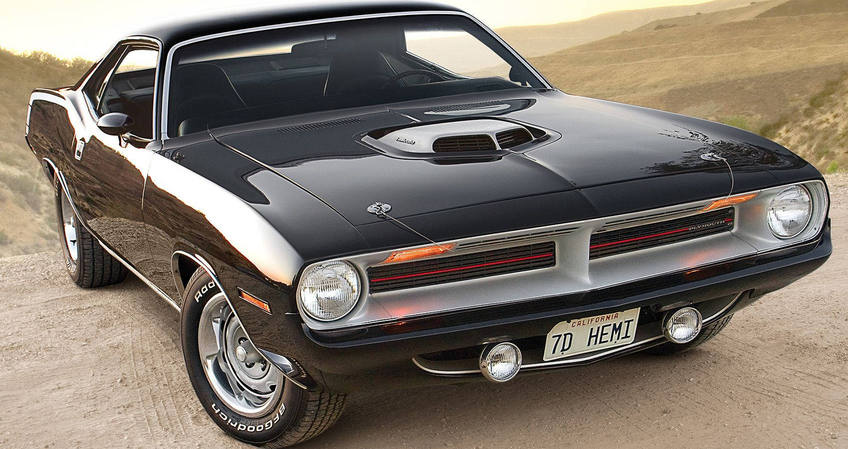 Black 1970 Plymouth Barracuda On Desert