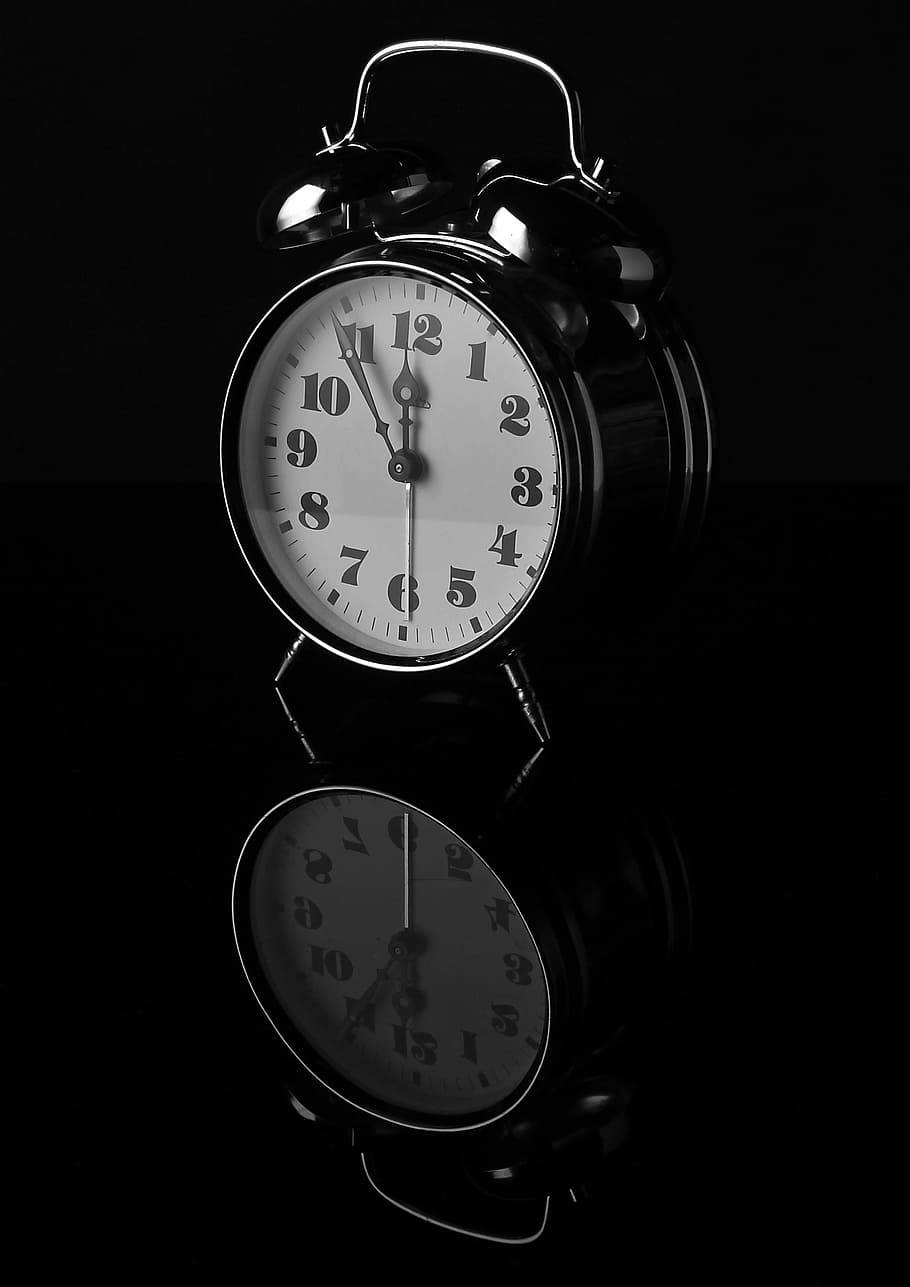 Black Alarm Clock Mirroring Background