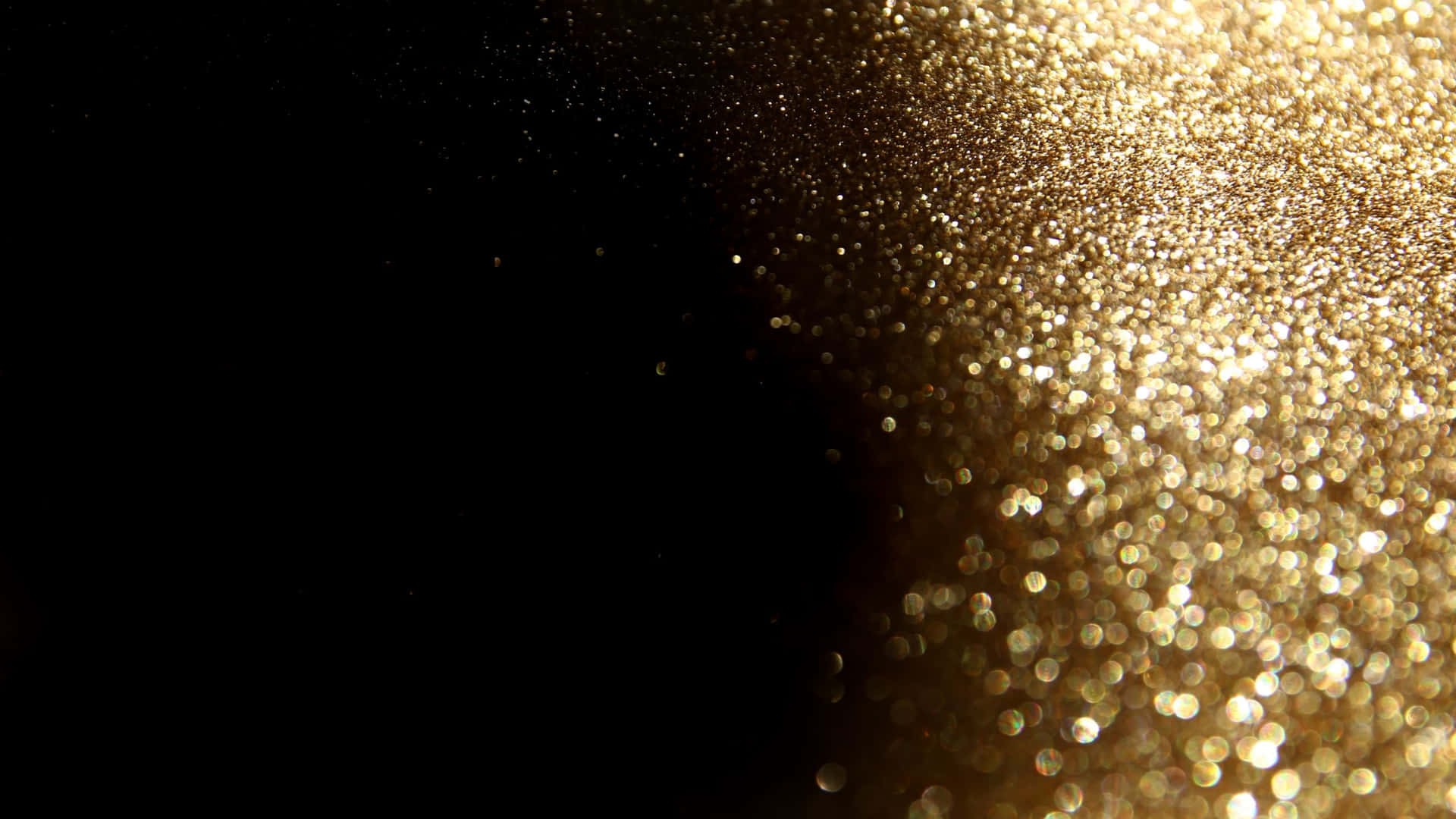 Black And Gold Glitter Blurred Background