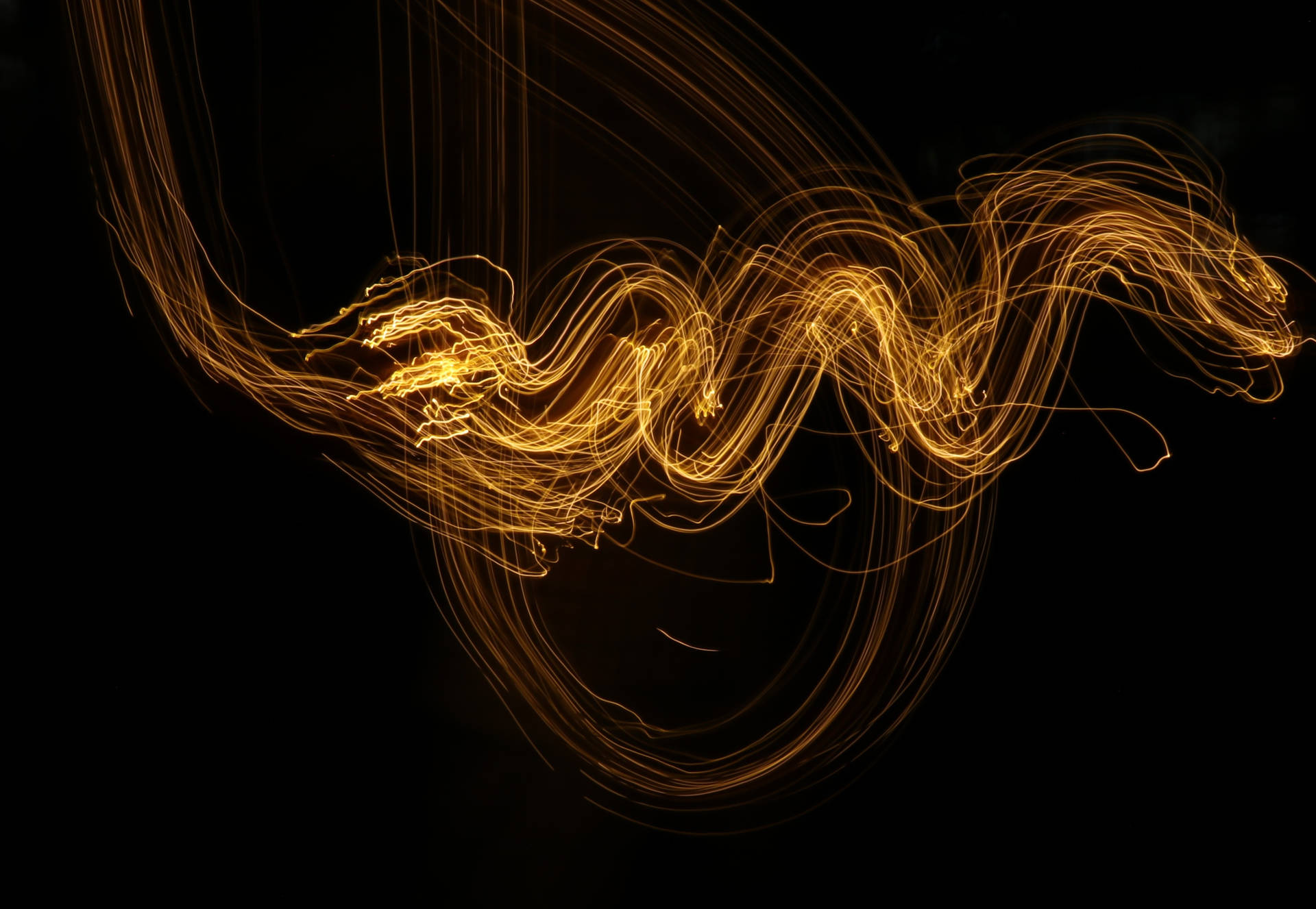 Black And Gold Glowing Abstract Lines Background