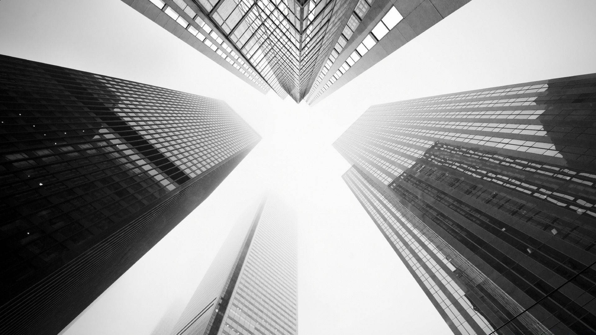 Black And White Aesthetic Skyscrapers From Below Background