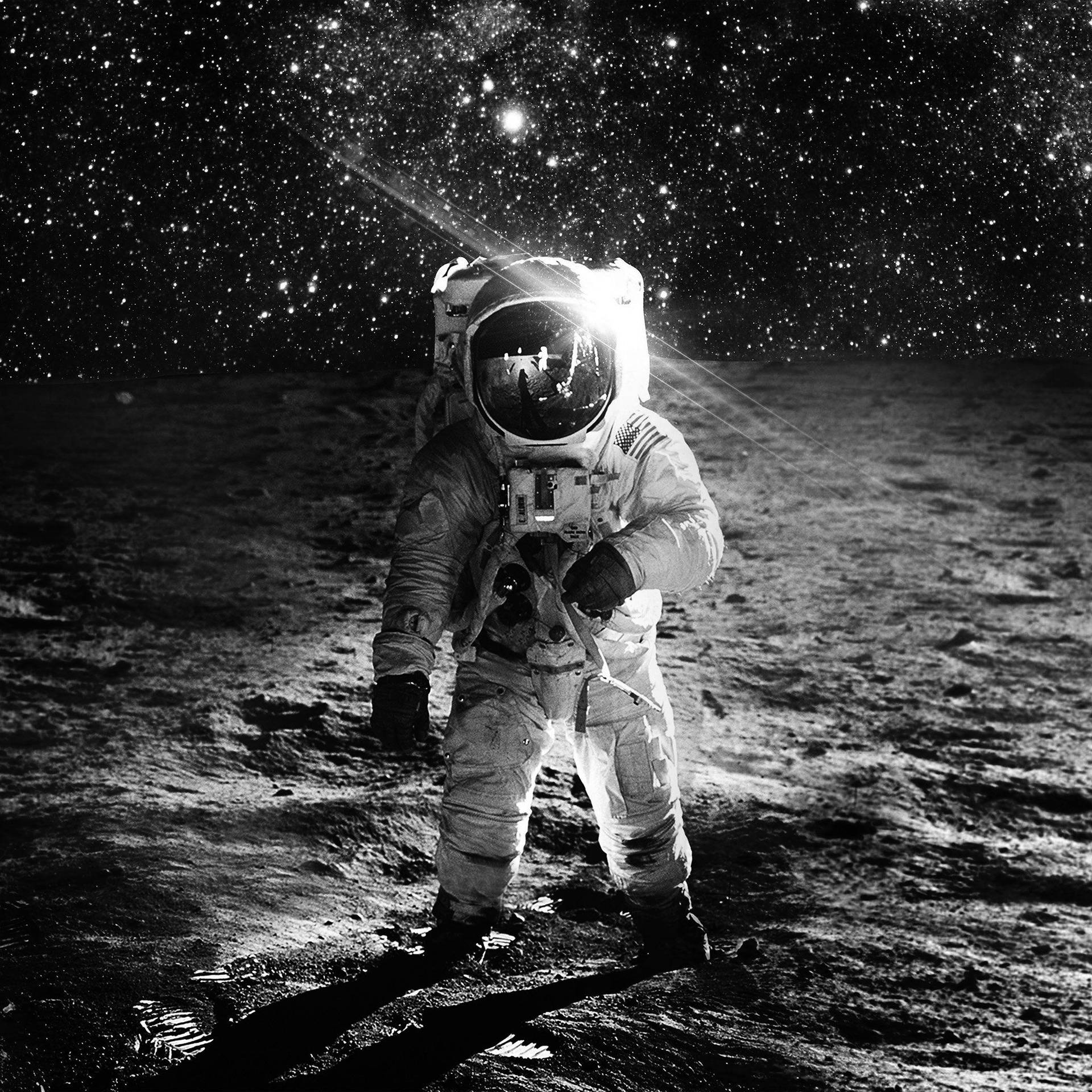 Black And White Astronaut Walking In Moon Background