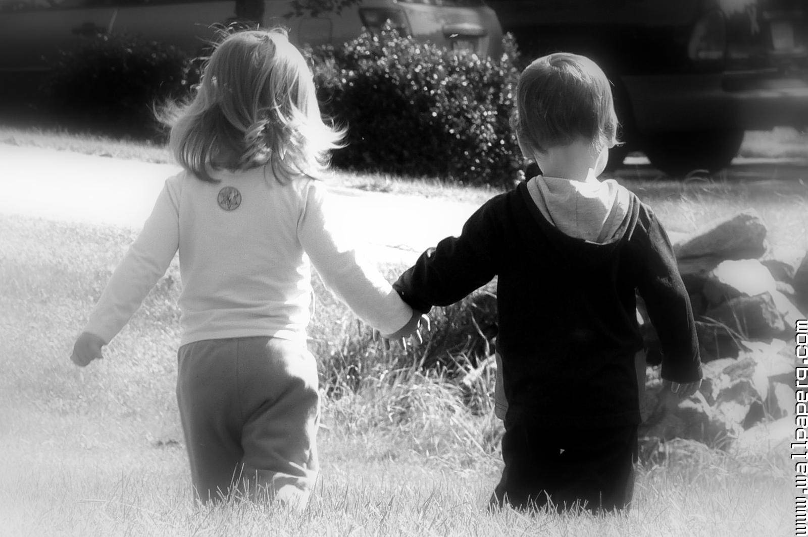 Black And White Boy And Girl Holding Hands Background