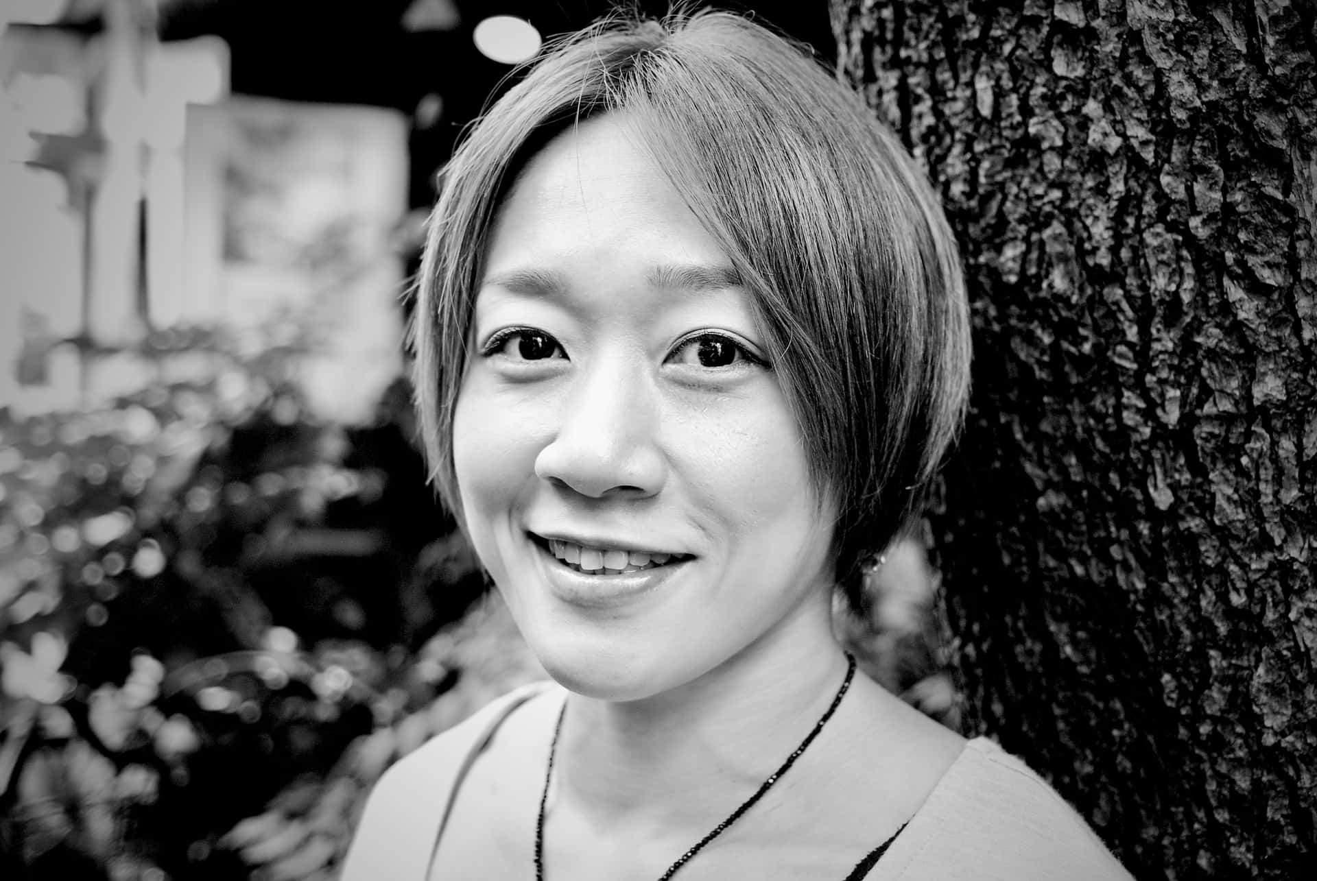 Black And White Japanese Mixed Martial Artist Megumi Fujii Background