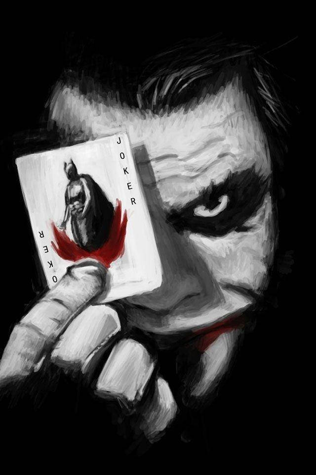 Black And White Joker Holding Up A Card Background