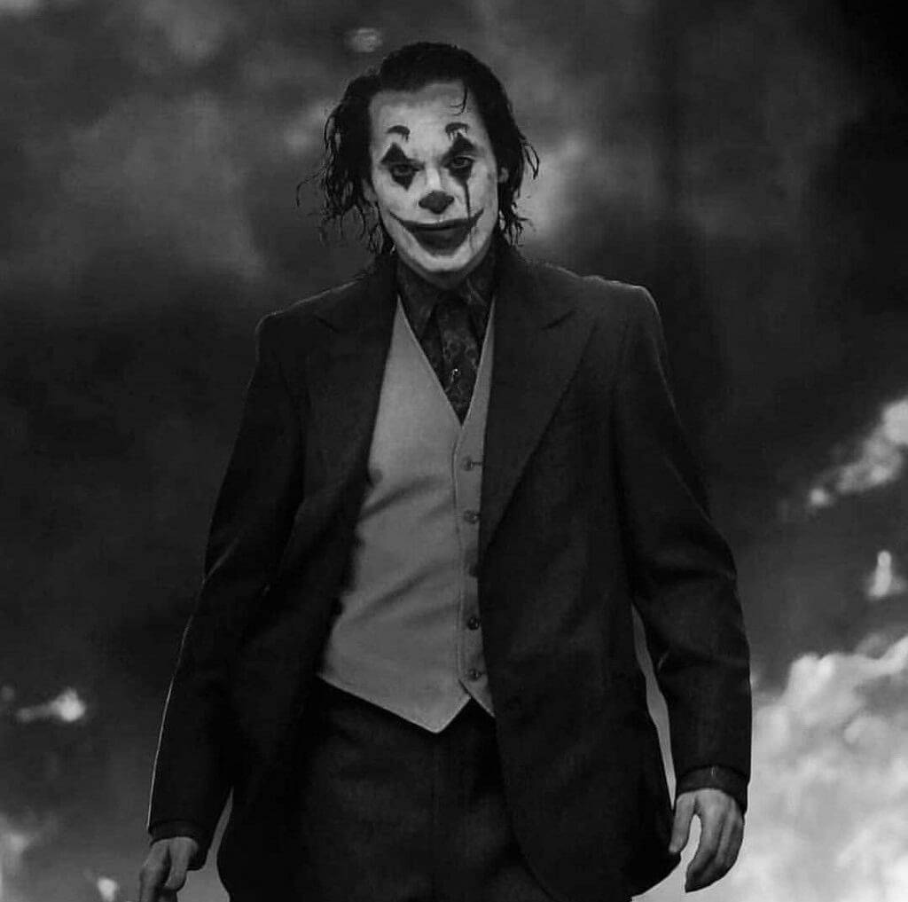 Black And White Joker Joaquin Phoenix Walking Background