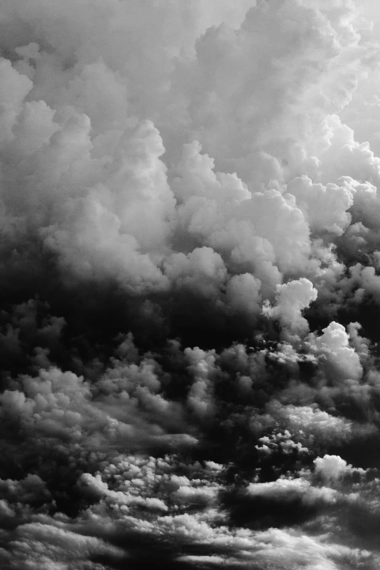 Black And White Photo Of Clouds In The Sky Background