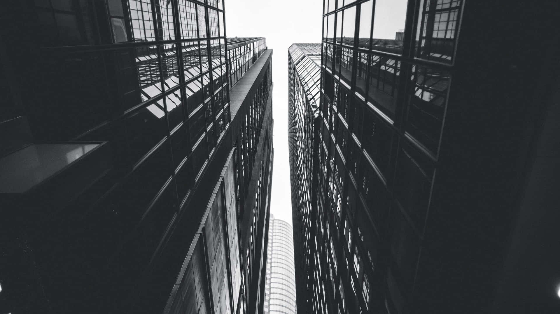 Black And White Photo Of Tall Buildings Background