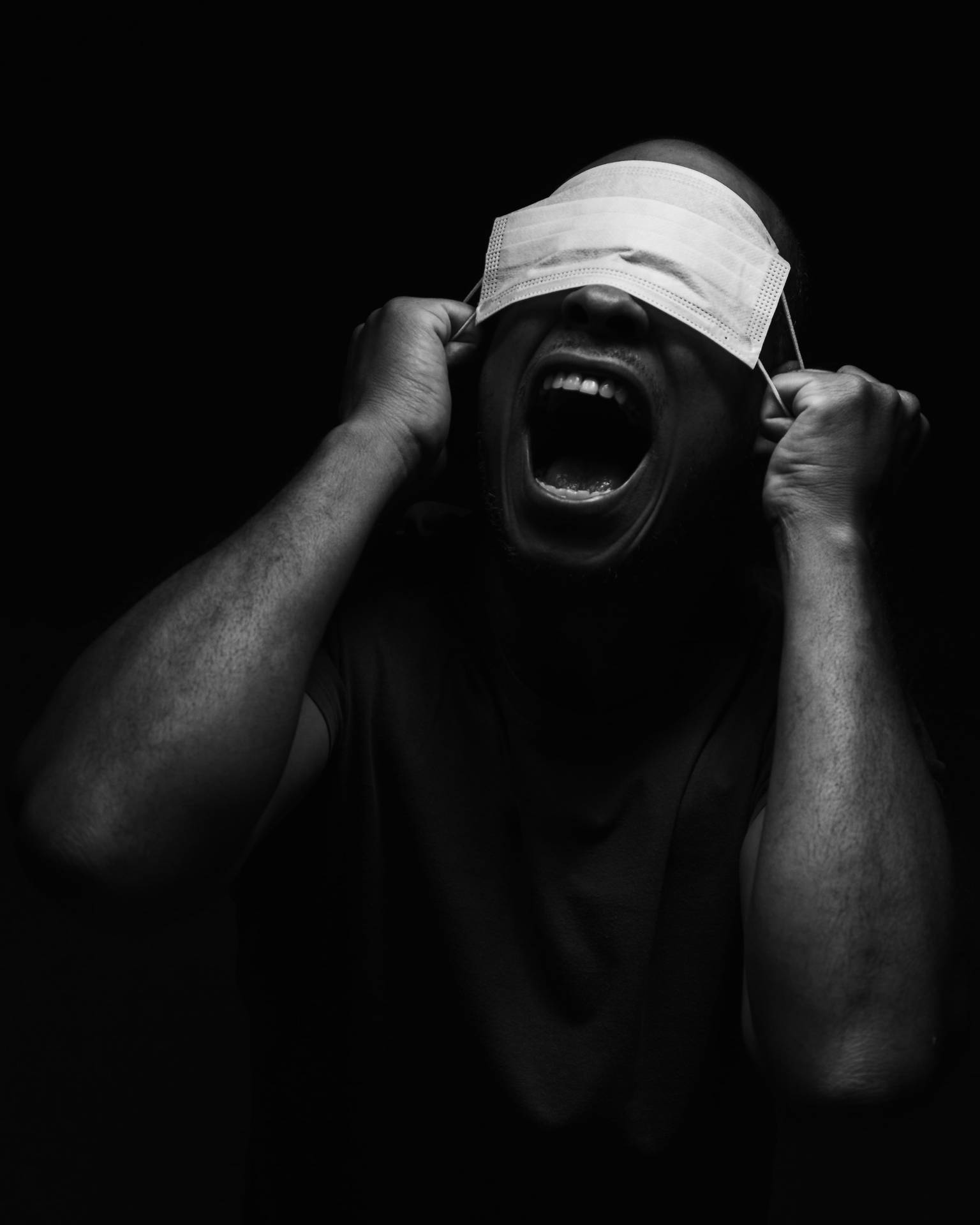 Black And White Portrait Of A Man With A Mask Background