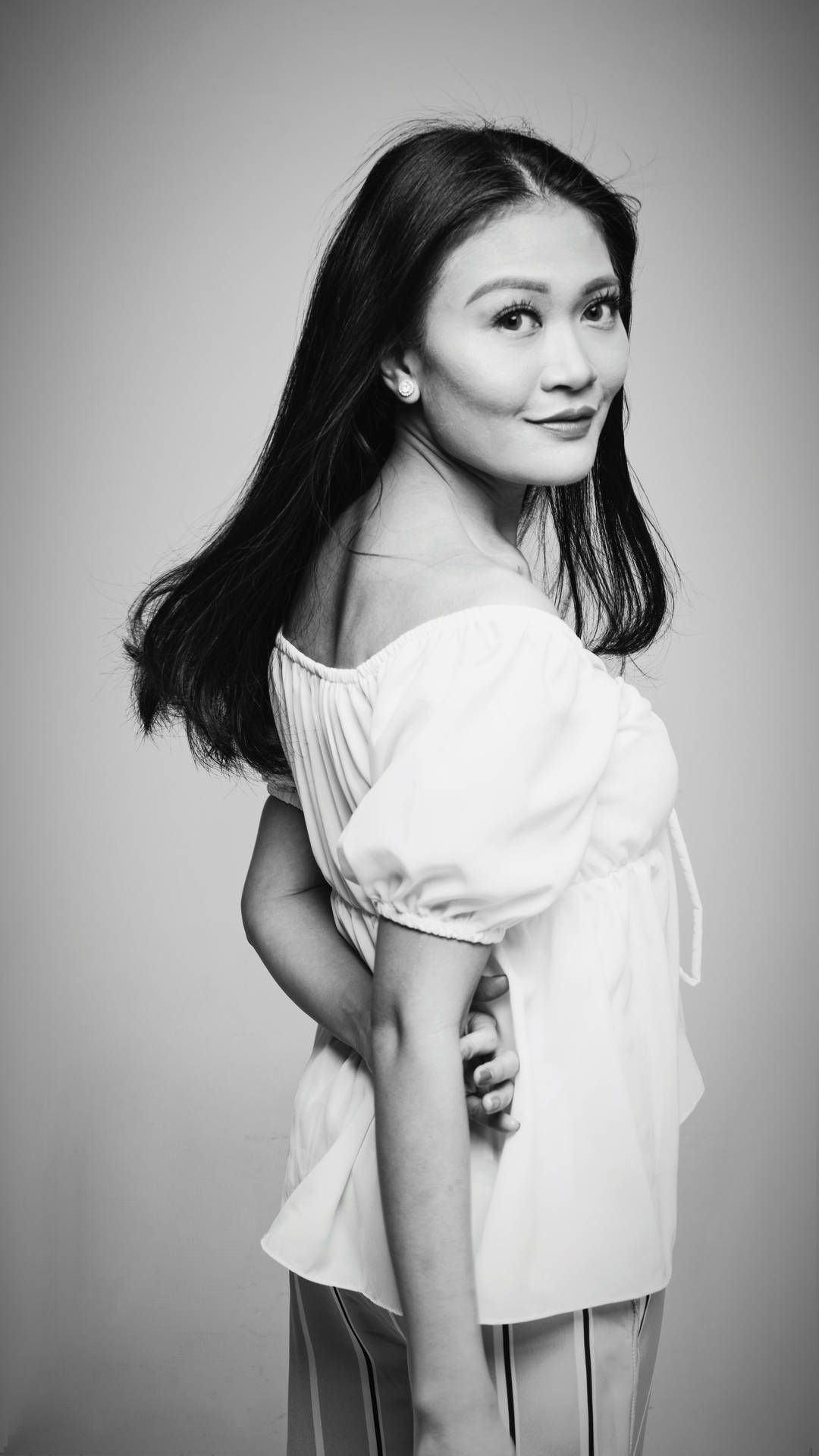 Black And White Portrait Of A Woman In White