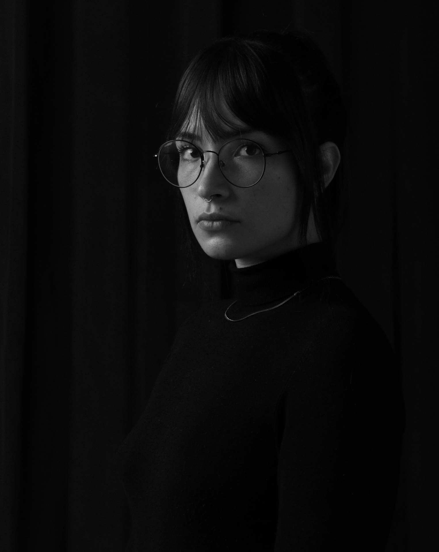 Black And White Portrait Of A Woman With Eyeglasses Background