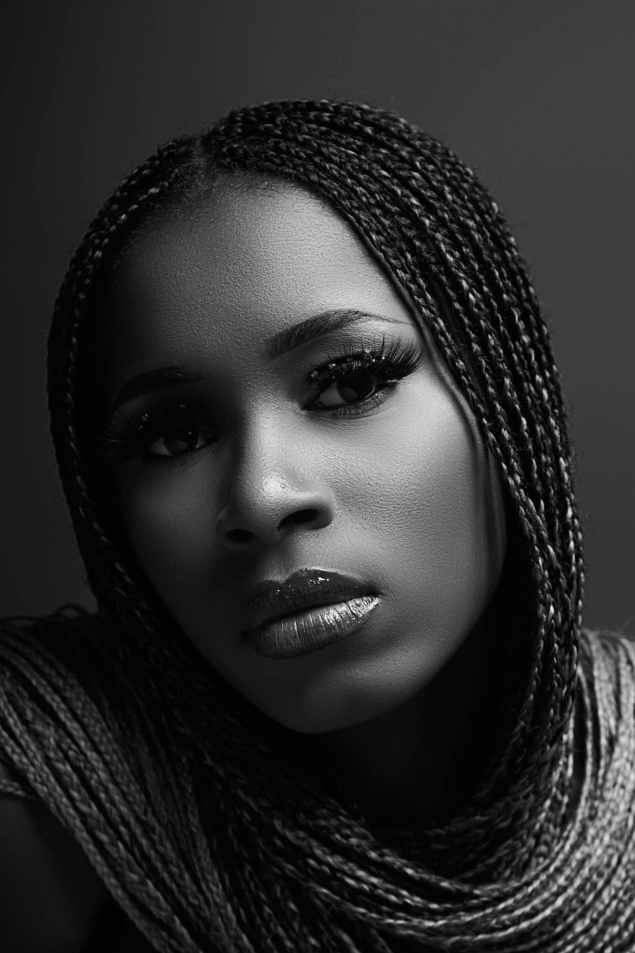 Black And White Portrait Of A Woman With Long Eyelashes Background