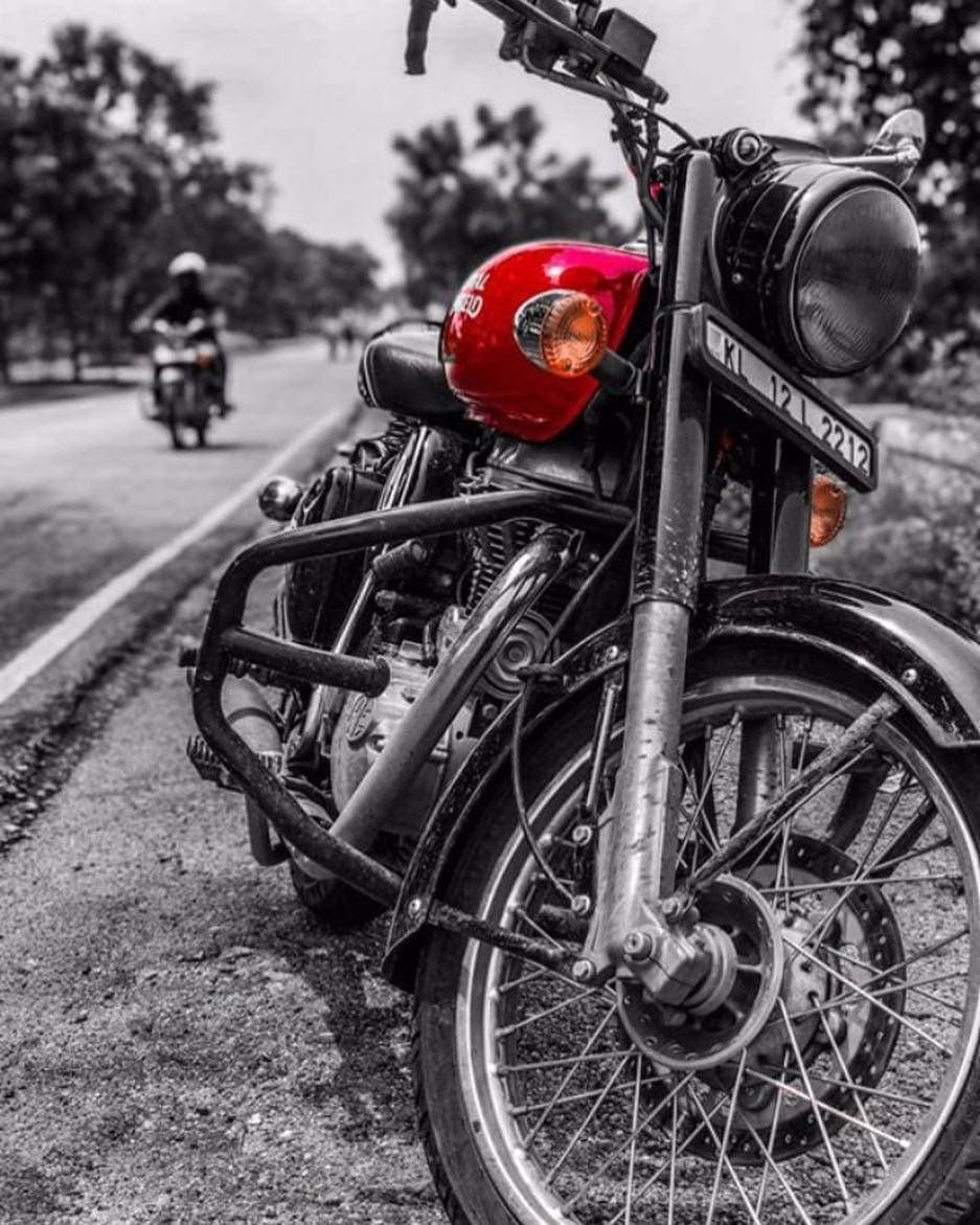 Black And White Royal Enfield Hd By Roadside Background