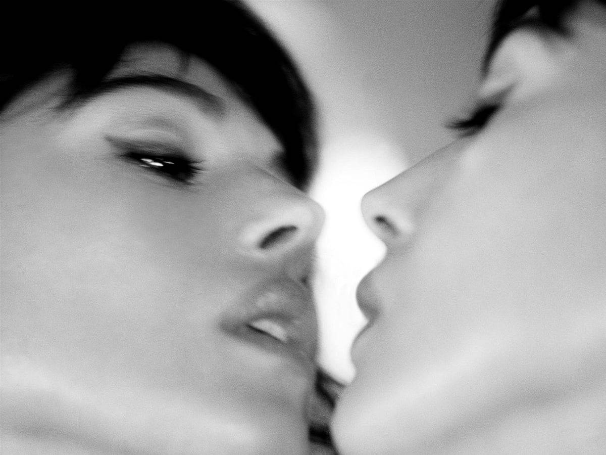 Black And White Women Kissing Background