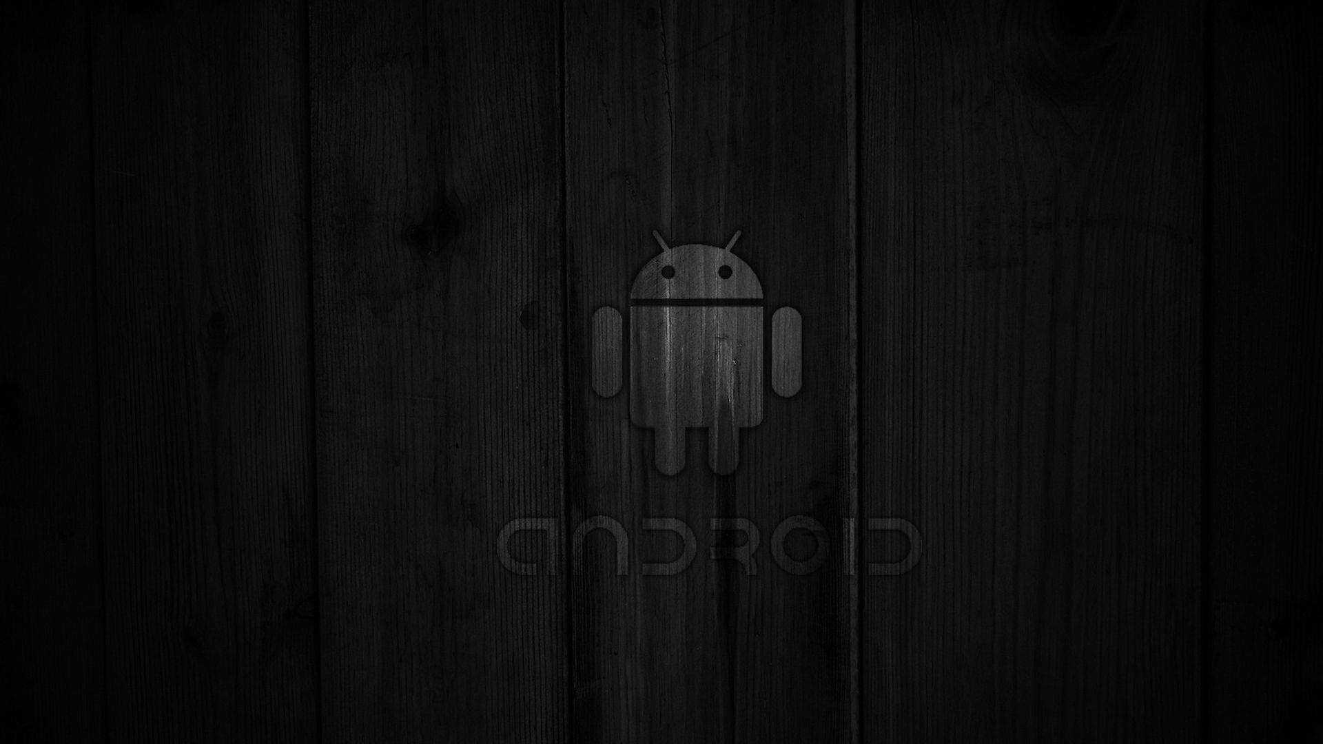 Black Android Logo In Wood Background