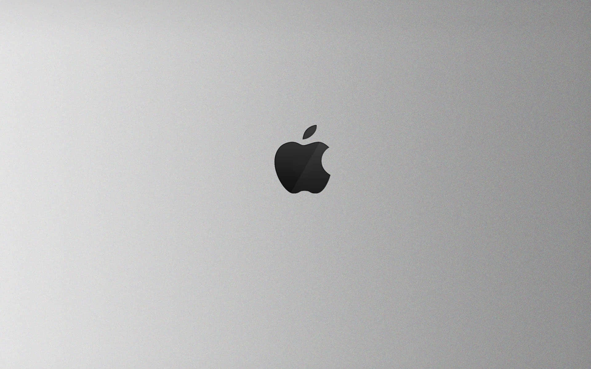 Black Apple Logo In Silver Background